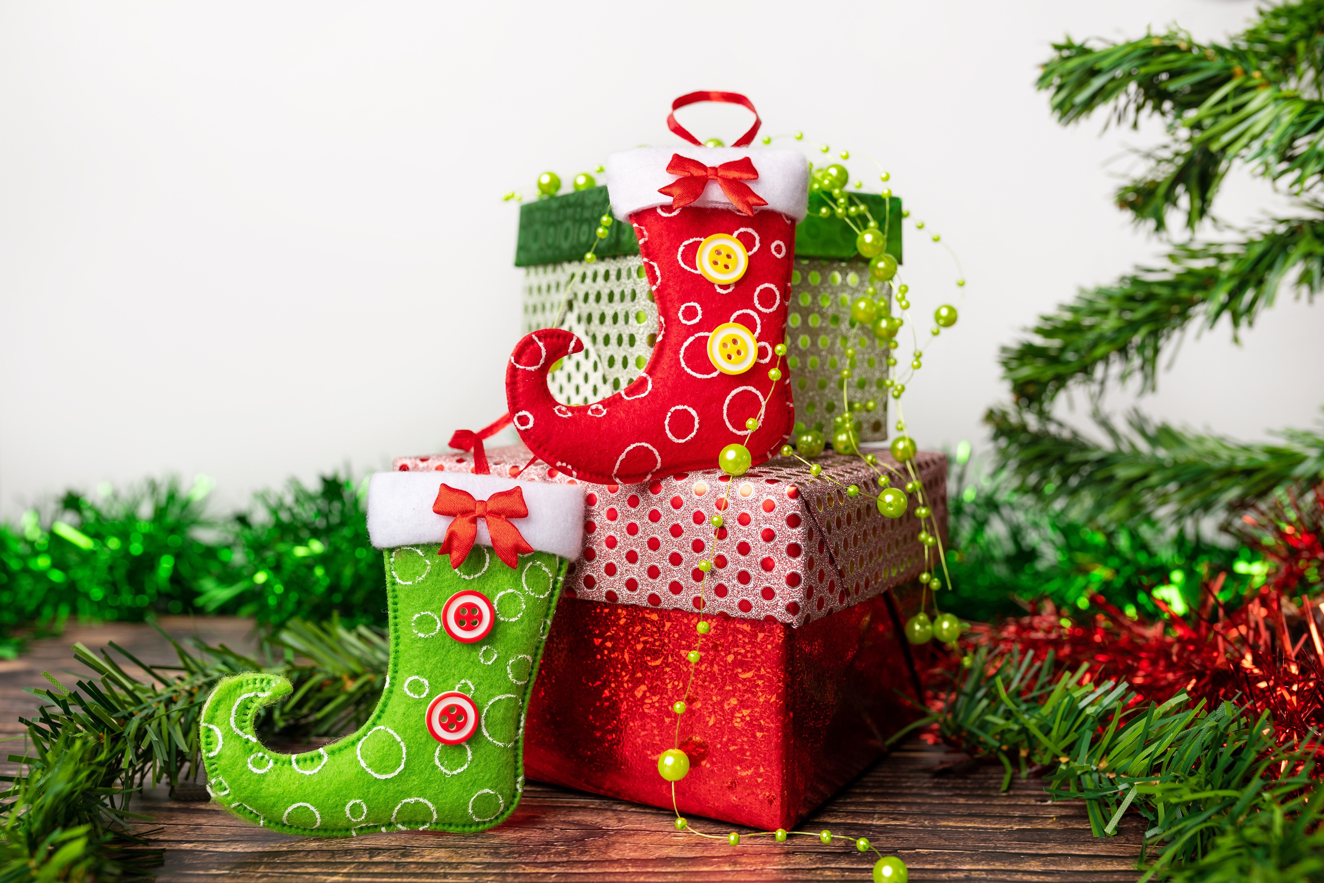 Christmas stockings and gifts with tree HD Wallpaper