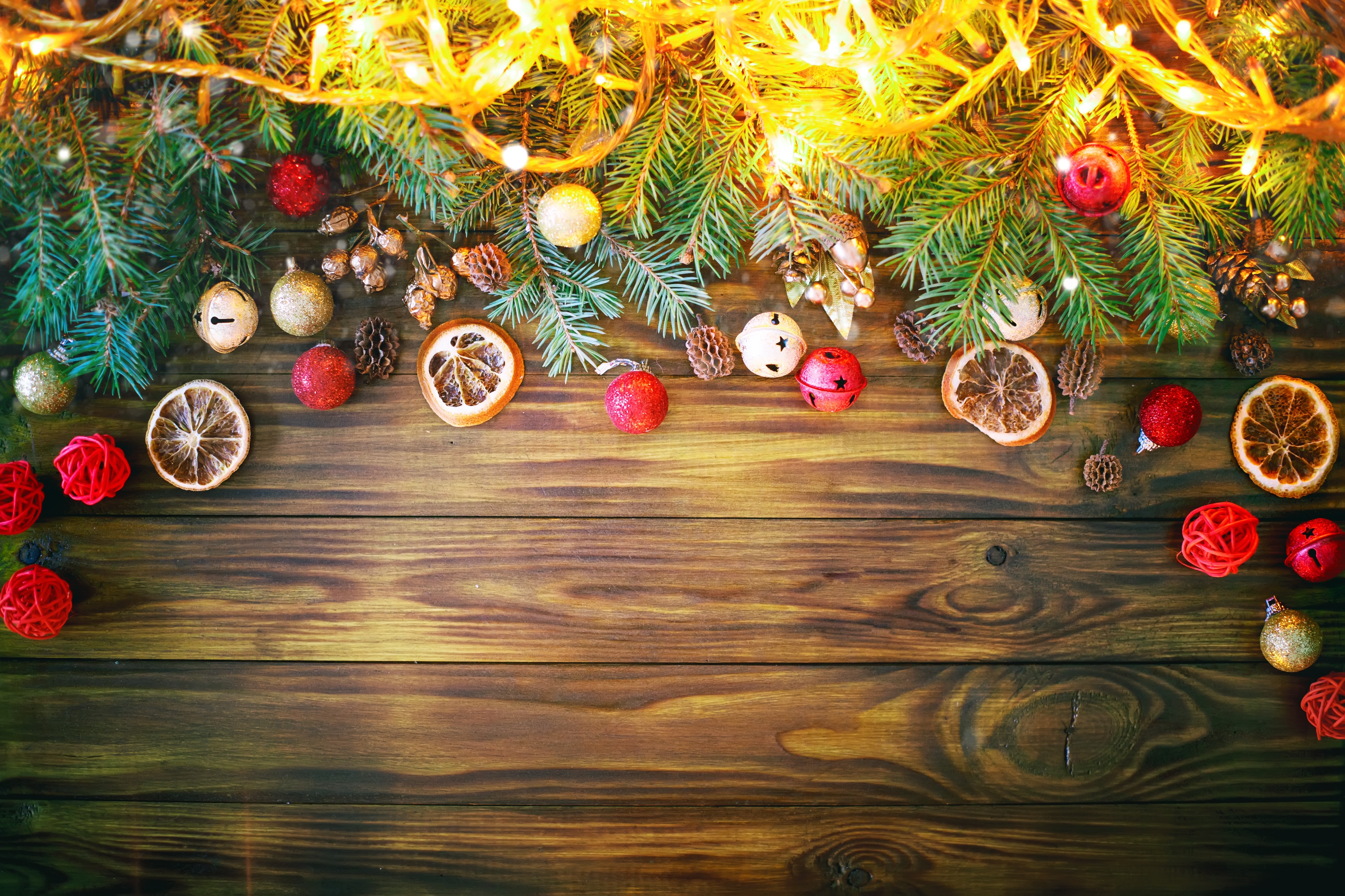 Christmas Decorations on Wooden Table with Fairy Lights HD Wallpaper