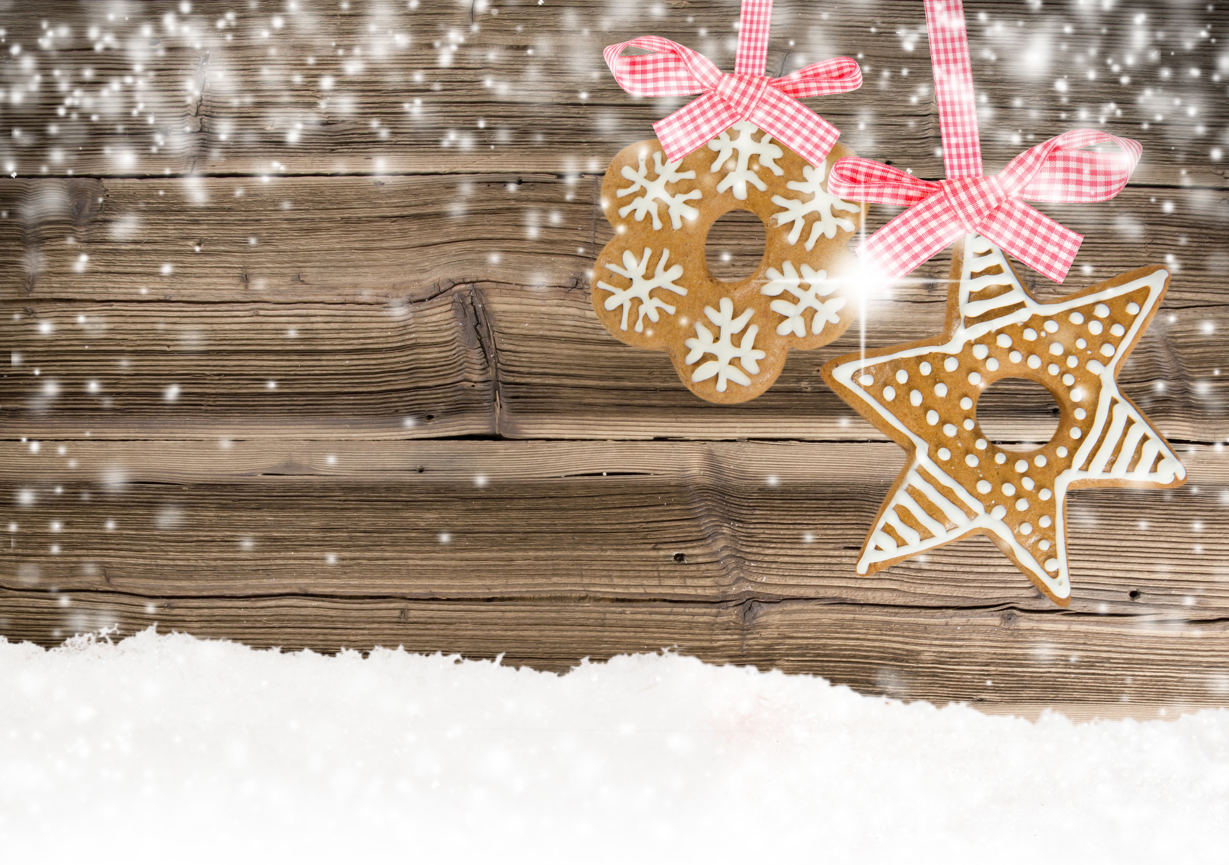 Christmas gingerbread cookies with bows on wood planks HD Wallpaper