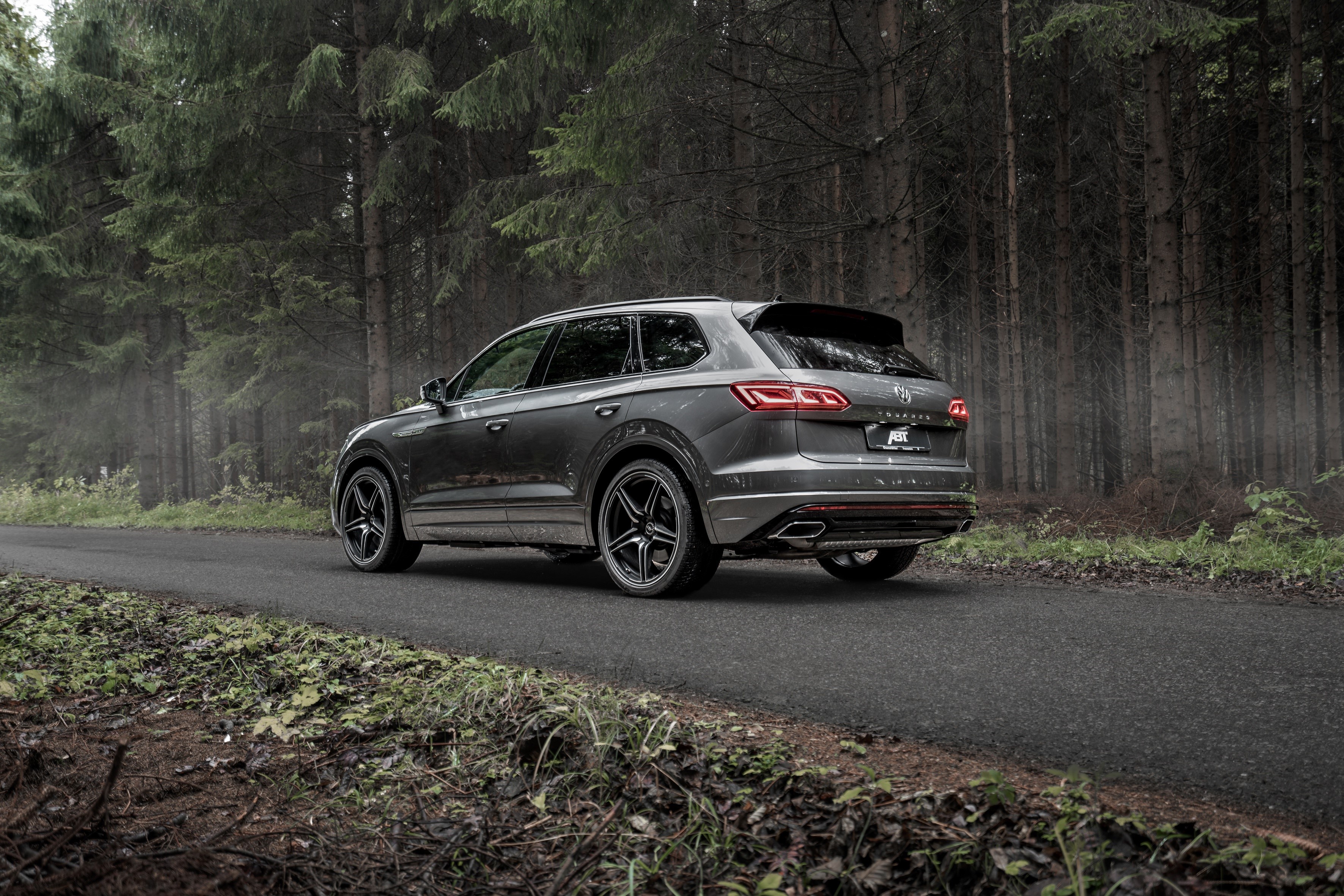 Grey ABT Volkswagen Touareg R-Line V8 TDI on a forest road HD Wallpaper