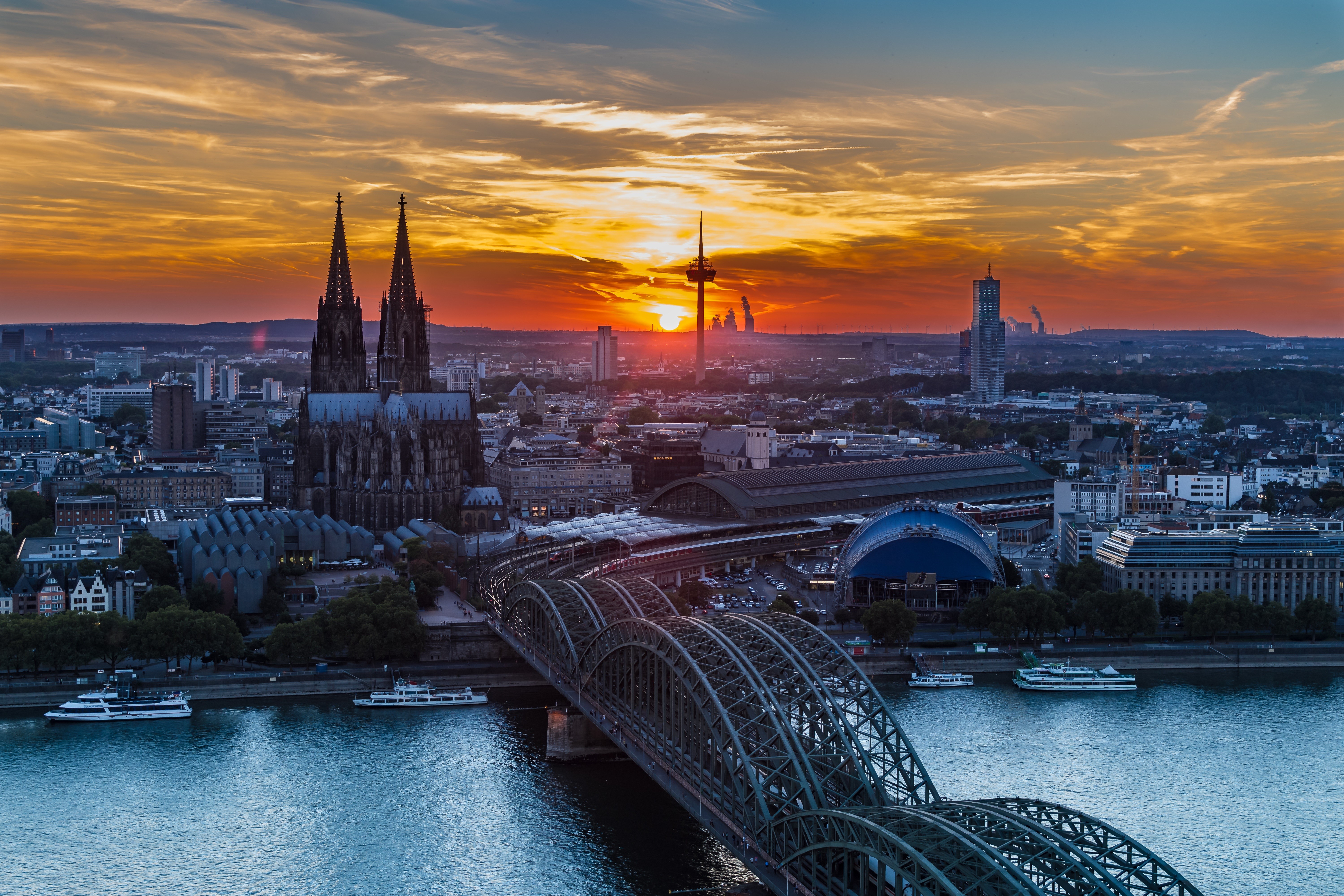 Cologne Cathedral and Hohenzollern Bridge at Sunset HD Wallpaper