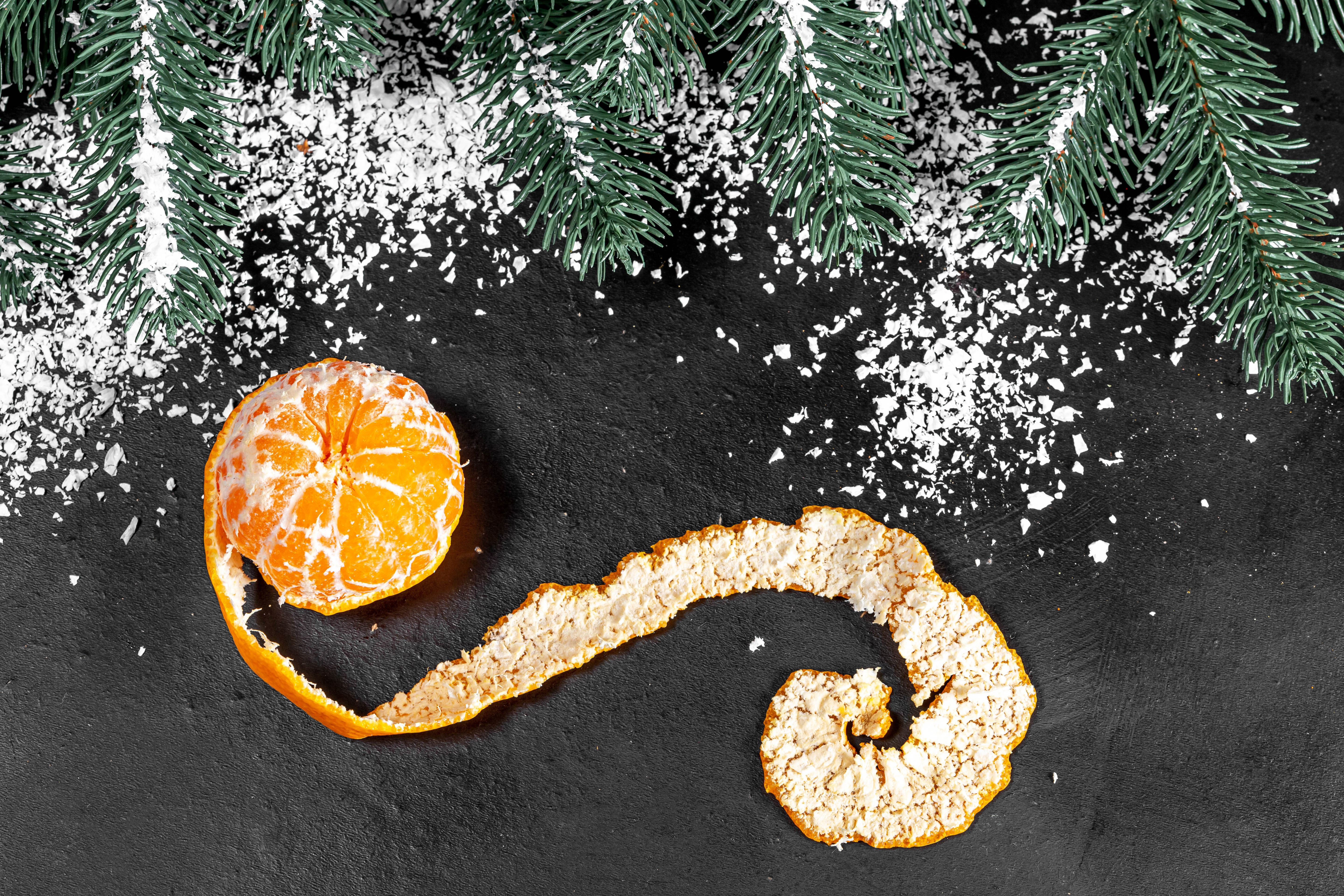 Mandarine with Christmas Tree Branches and Snow HD Wallpaper