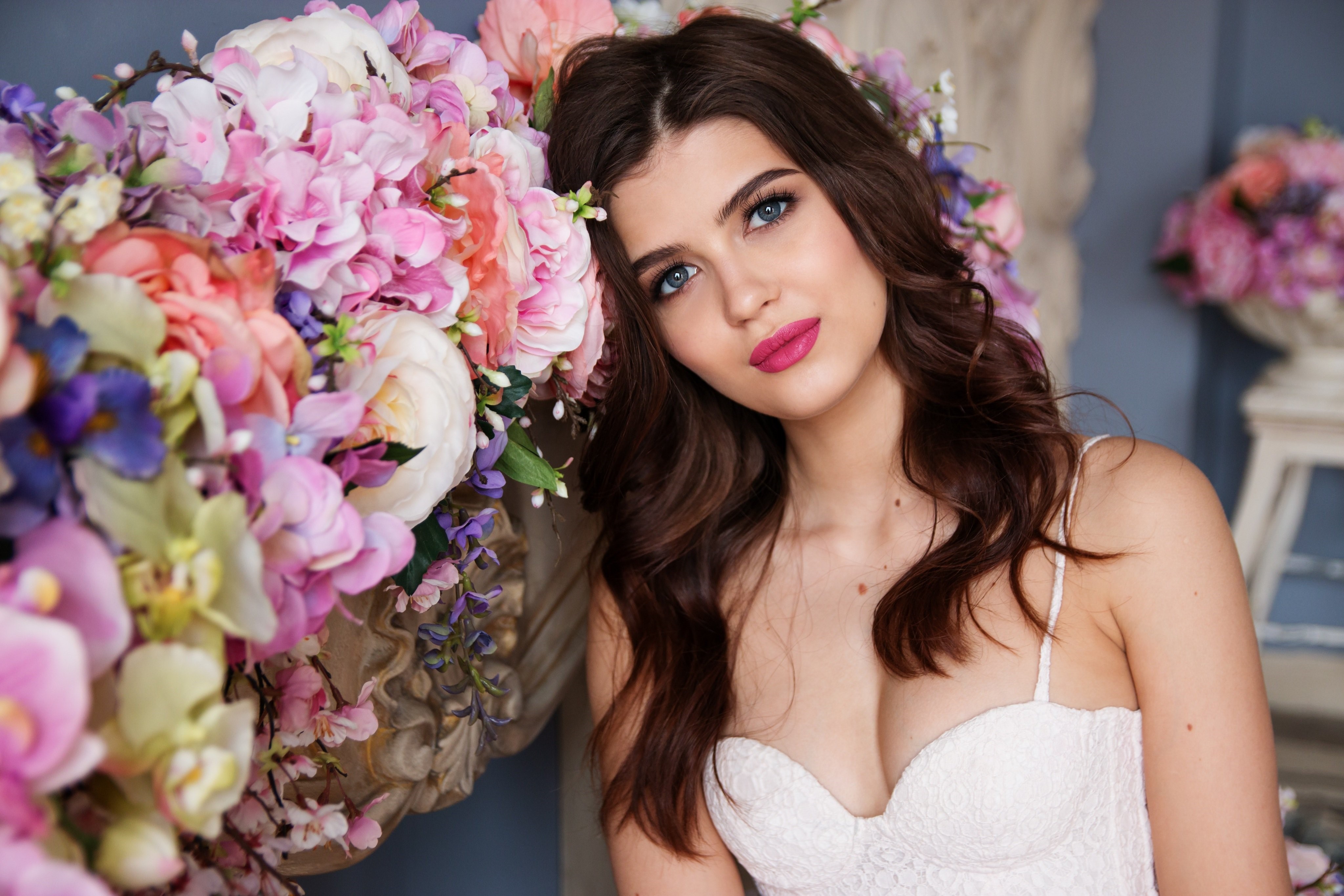 Beautiful woman with brown hair and flowers HD Wallpaper