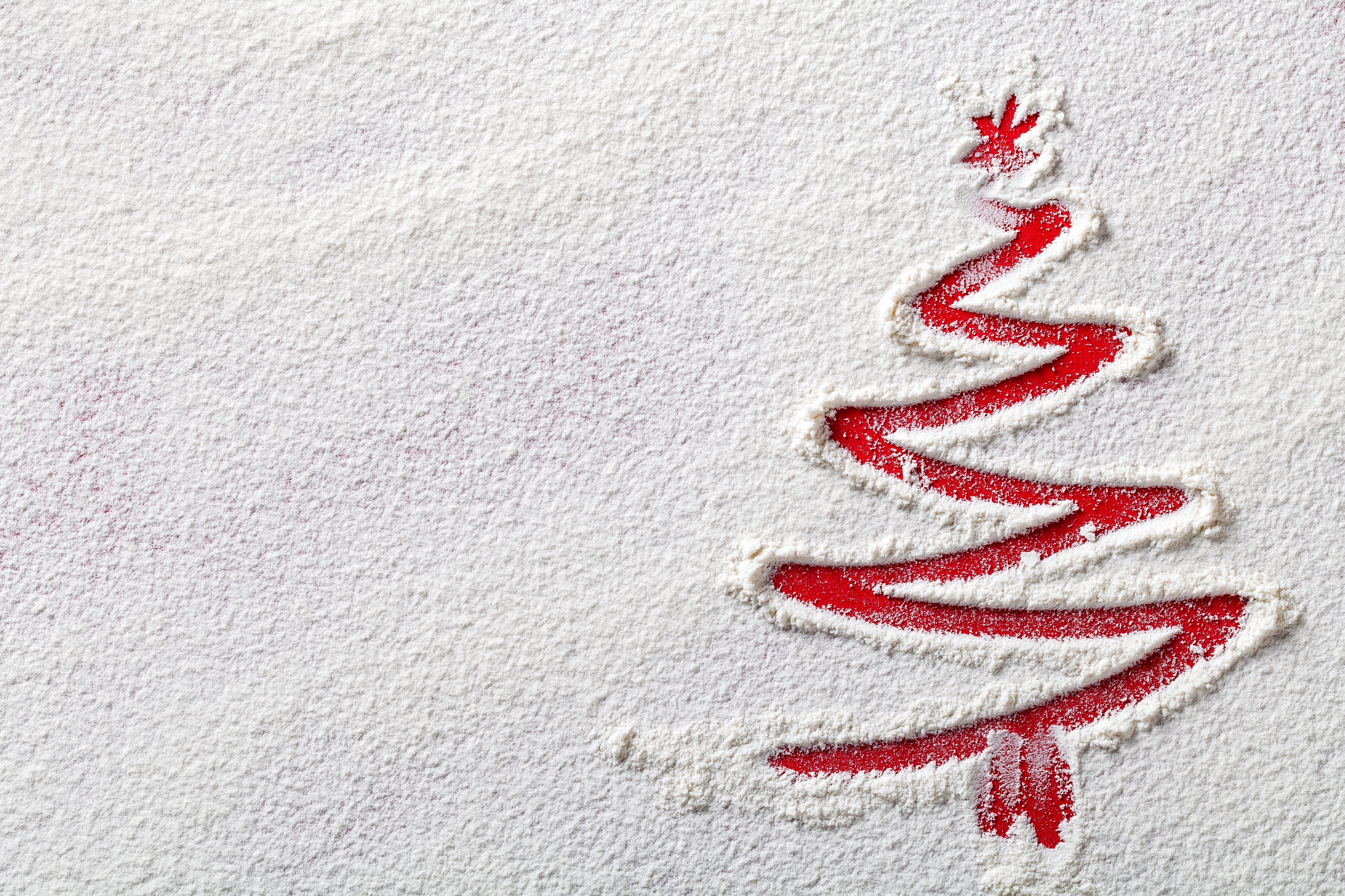 Christmas tree drawn in flour on red background HD Wallpaper