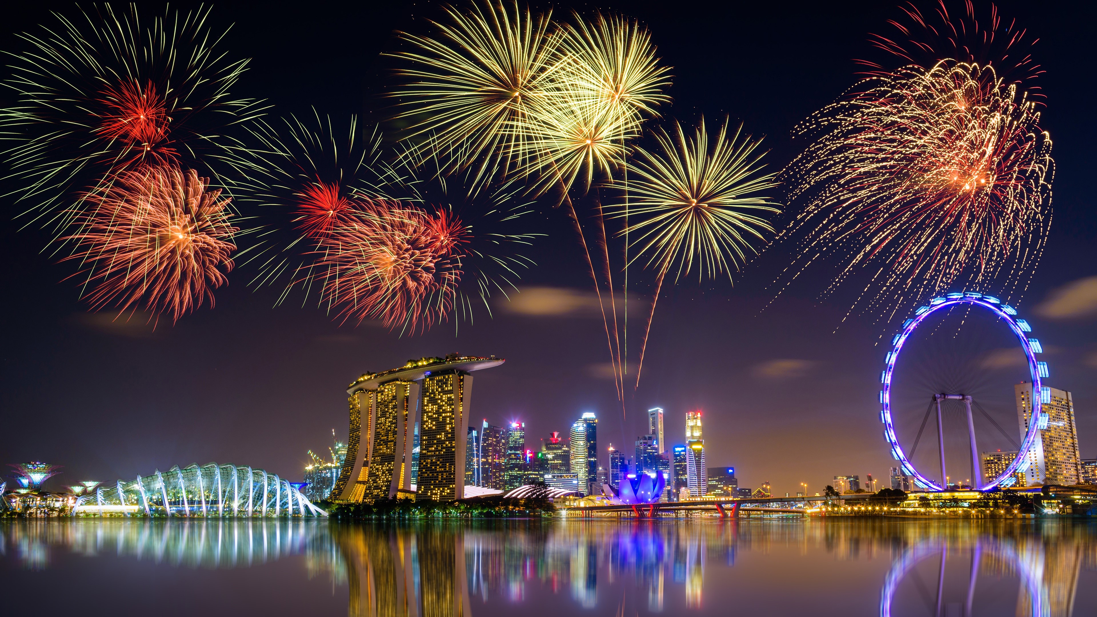 Singapore Skyline with Fireworks and Ferris Wheel HD Wallpaper