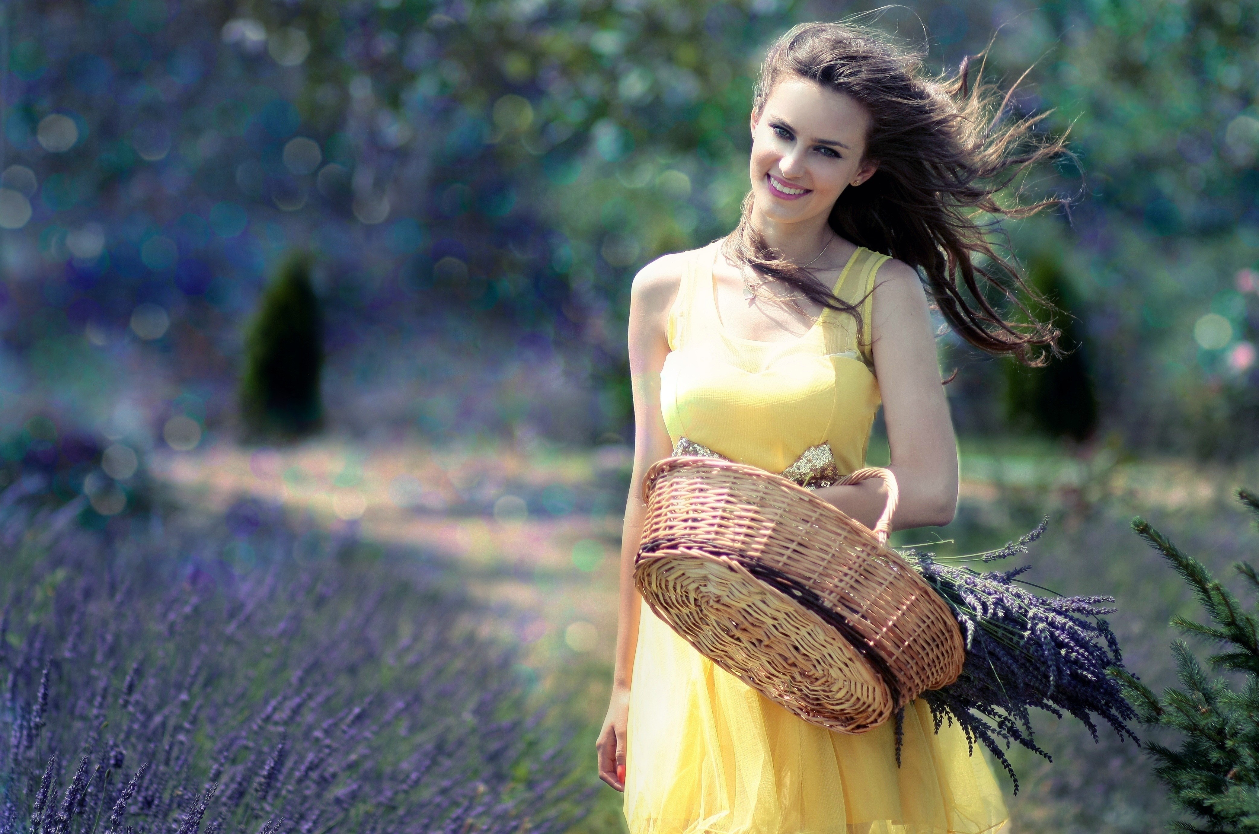 Woman in yellow dress holding basket in lavender field HD Wallpaper