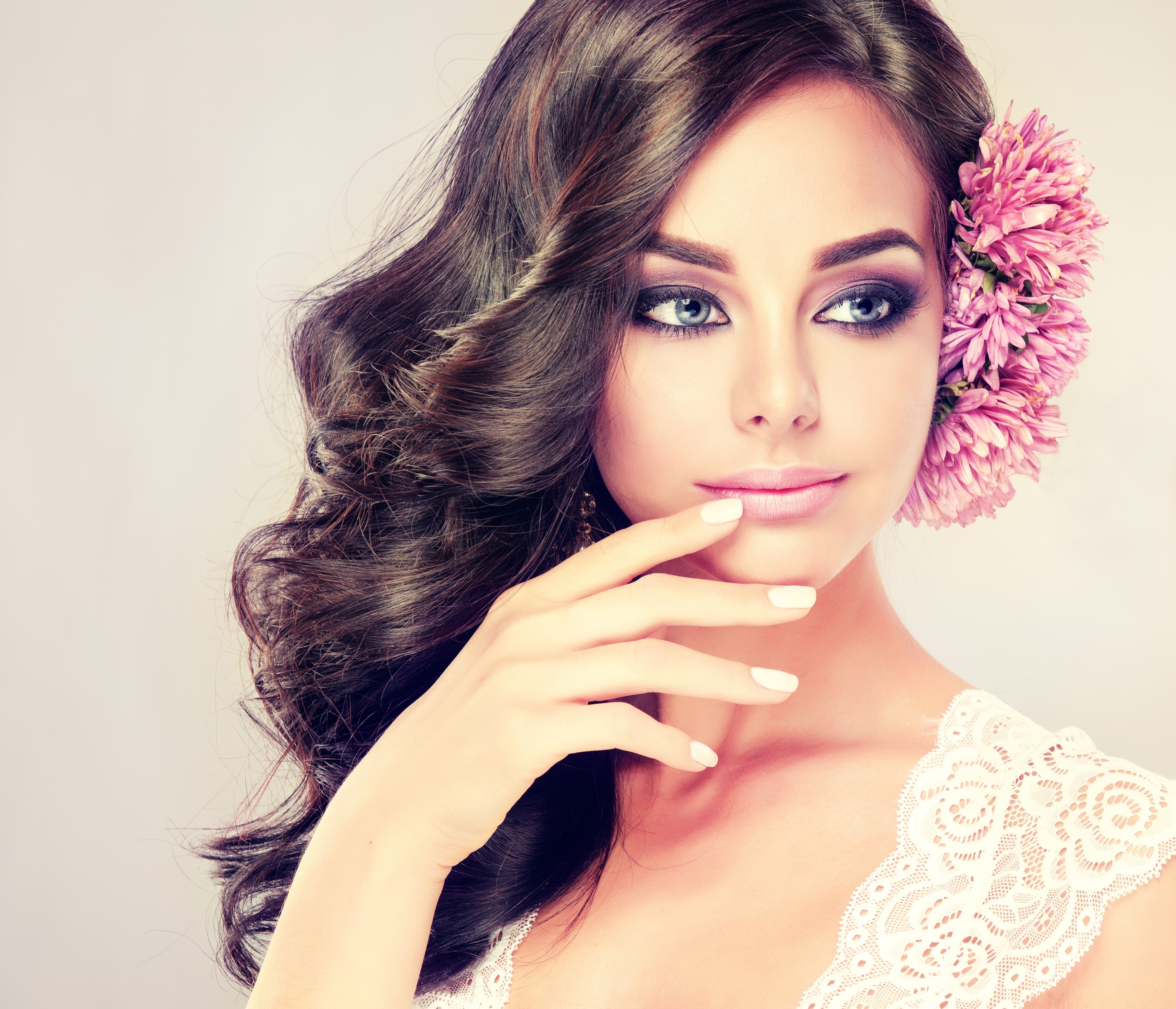 Brunette girl with flowers in hair and makeup HD Wallpaper