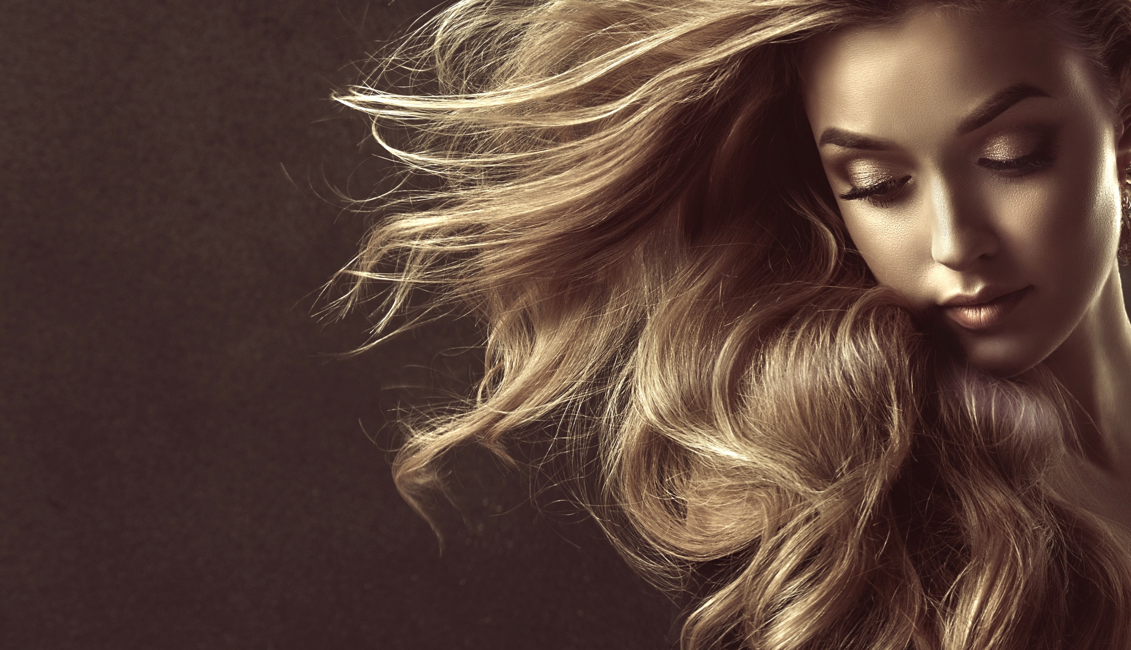 Woman with flowing dark blonde hair by Sofia Zhuravets HD Wallpaper
