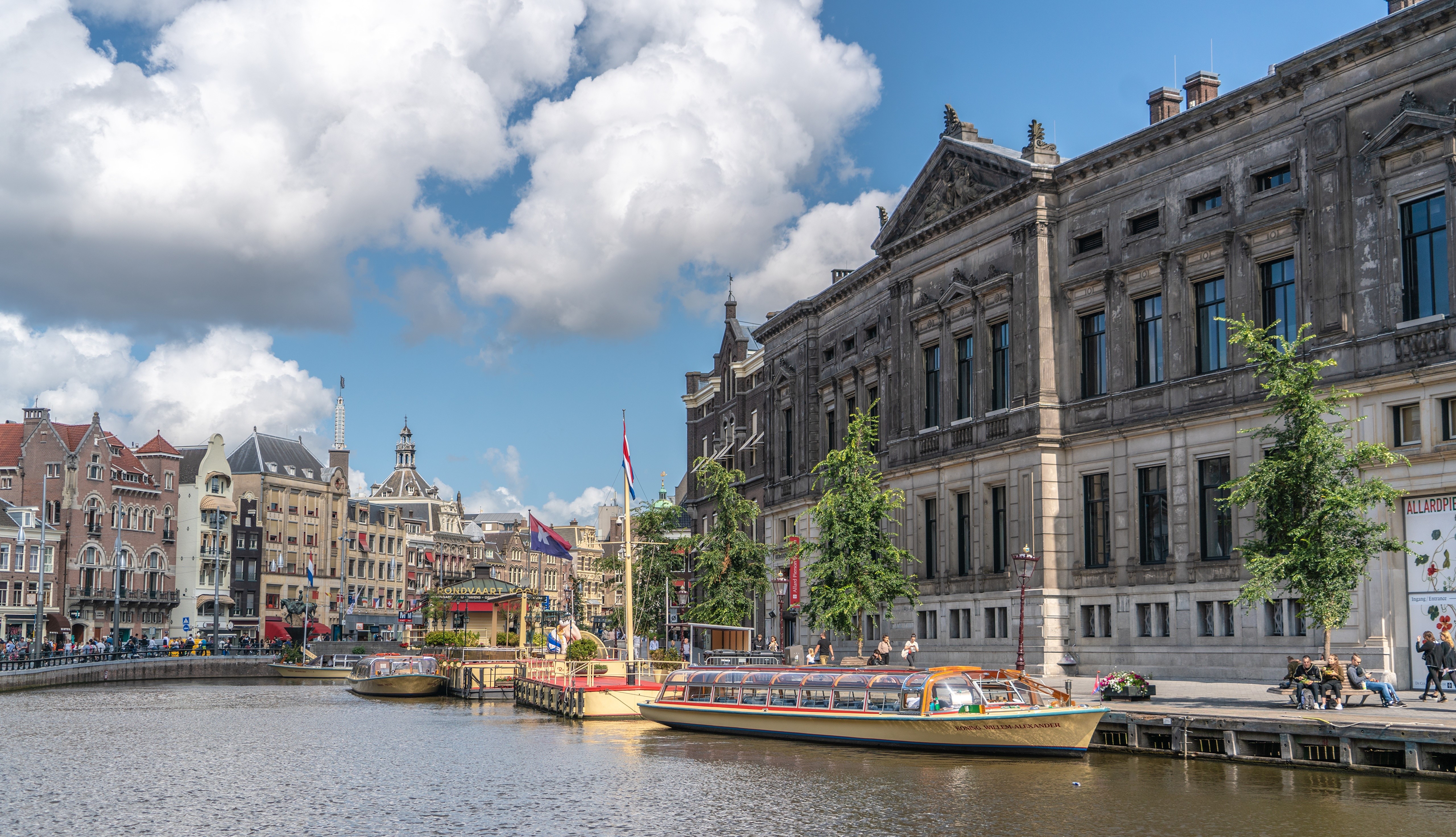 Amsterdam Canal with Riverboats and Buildings HD Wallpaper