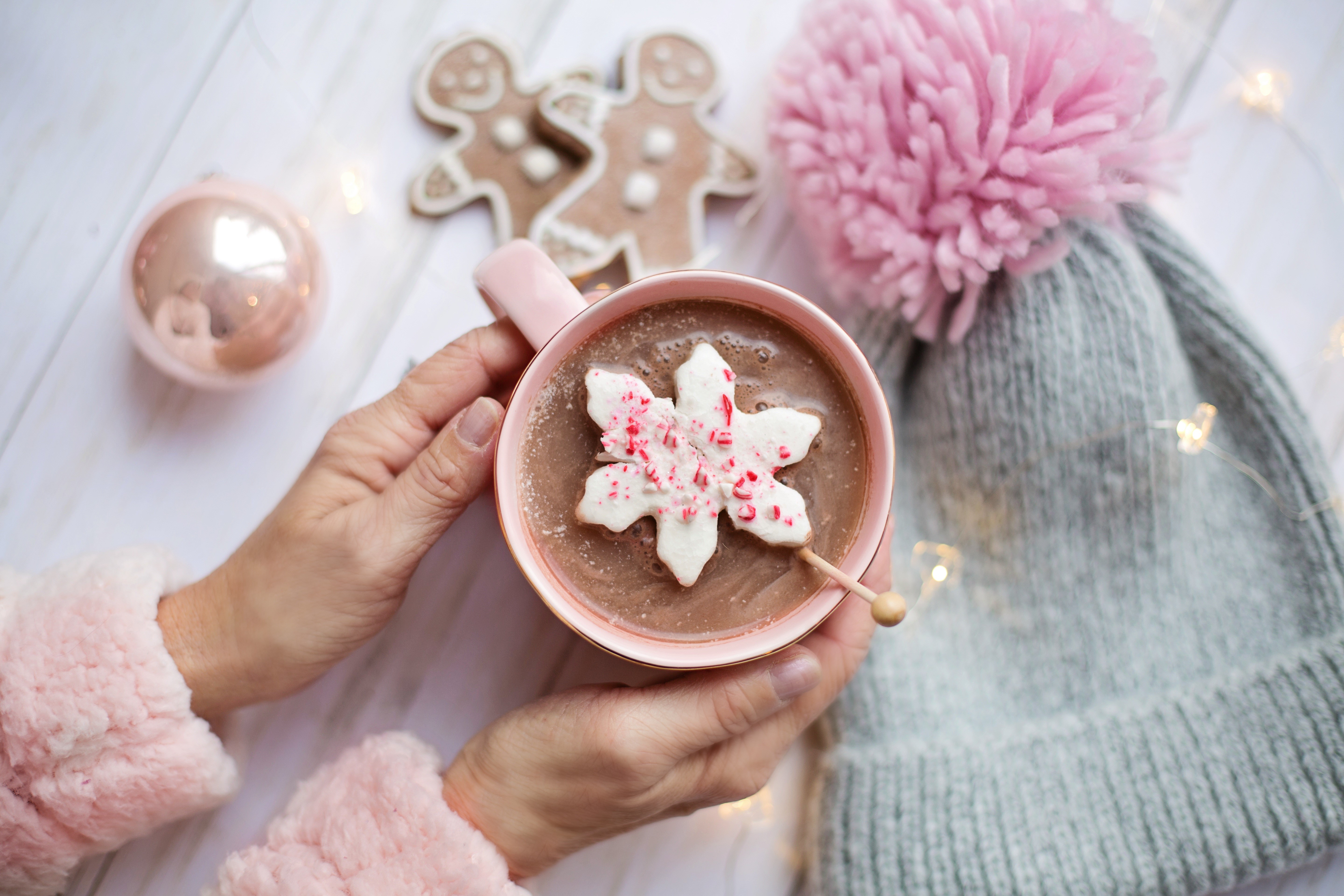 Hot chocolate with snowflake cookie and winter hat HD Wallpaper