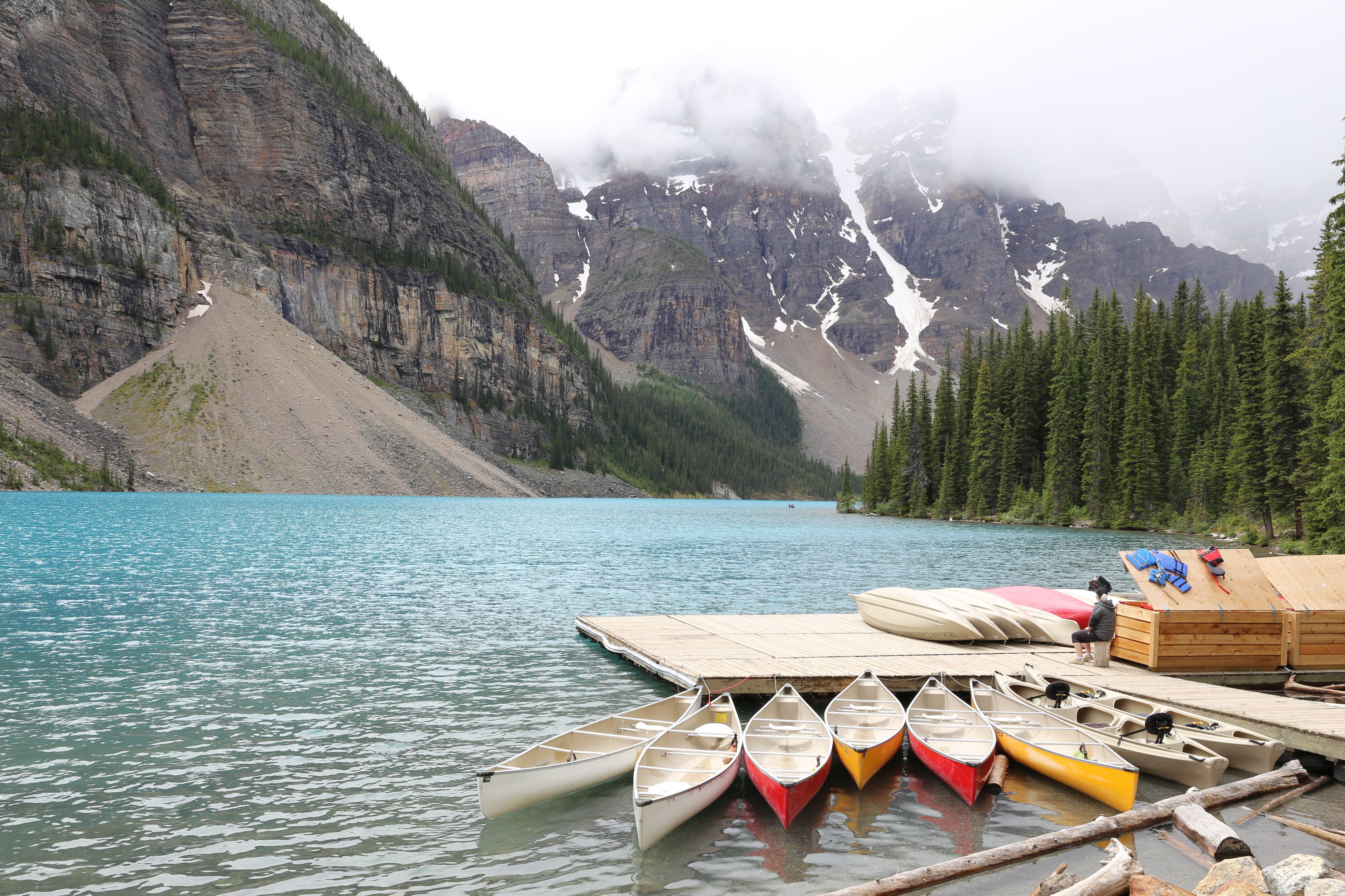 Moraine Lake with Canoes and Mountains in Banff National Park HD Wallpaper