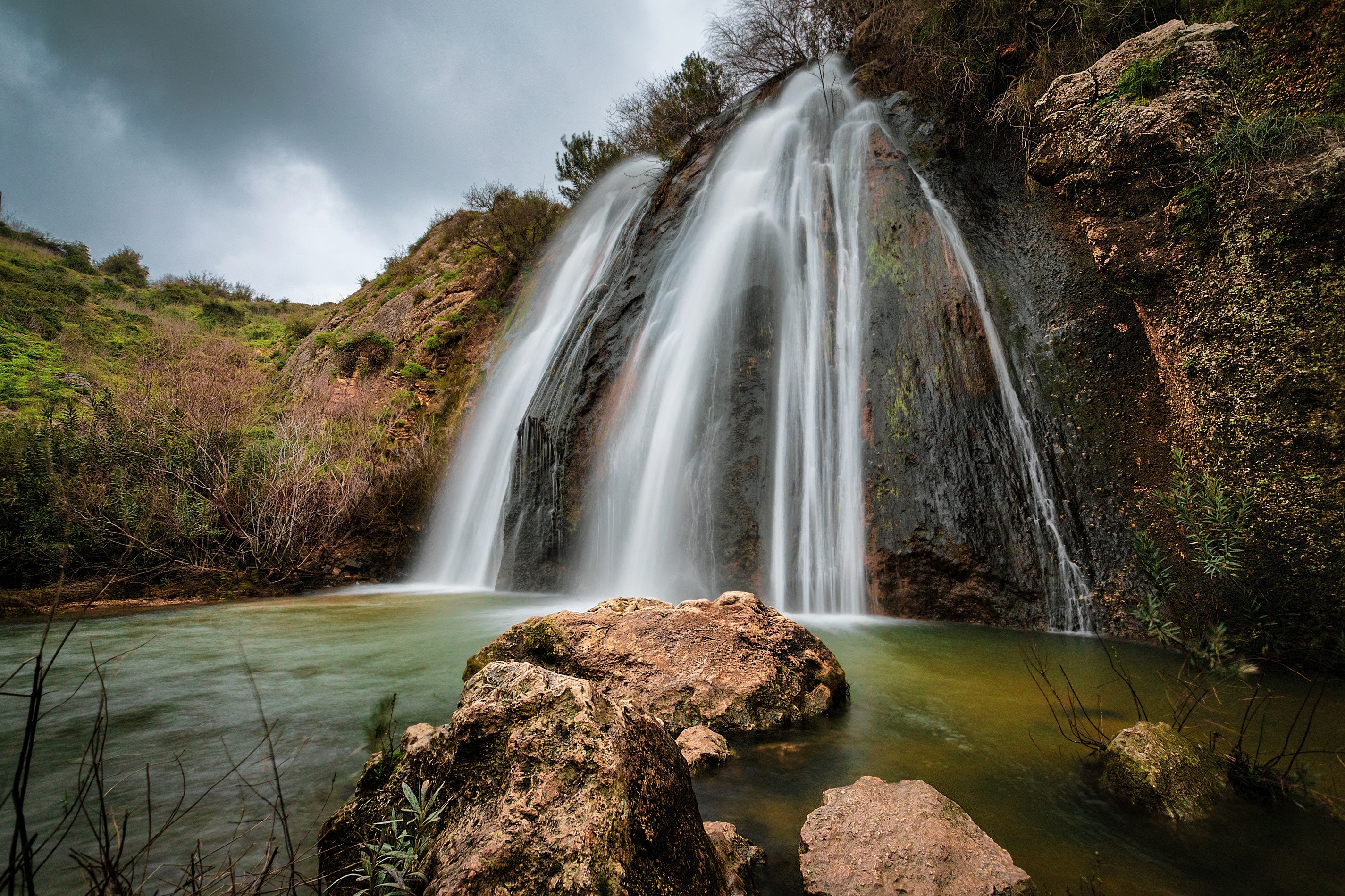 Waterfall in Northern Israel with rocks HD Wallpaper