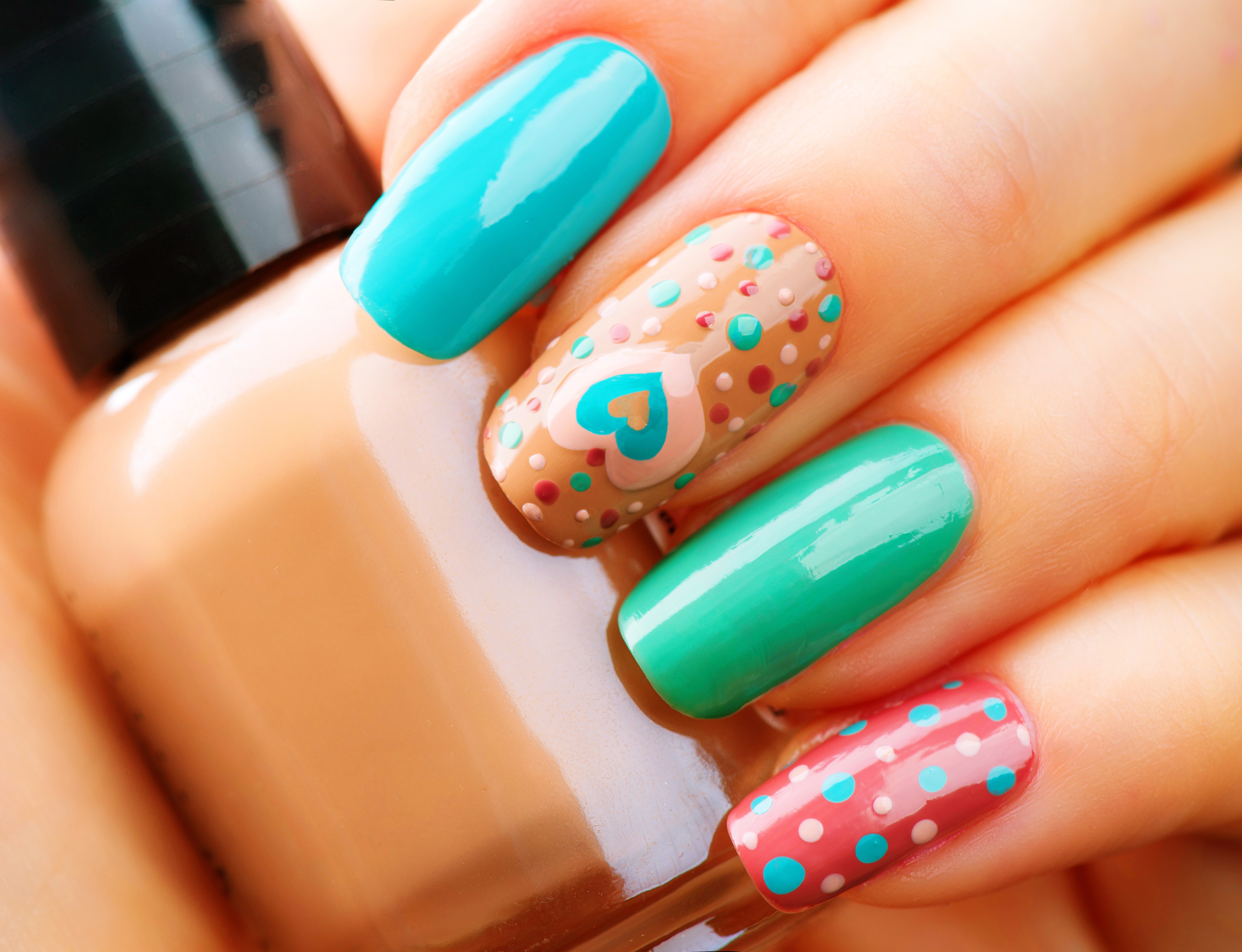 Manicure with heart and polka dots on fingers HD Wallpaper