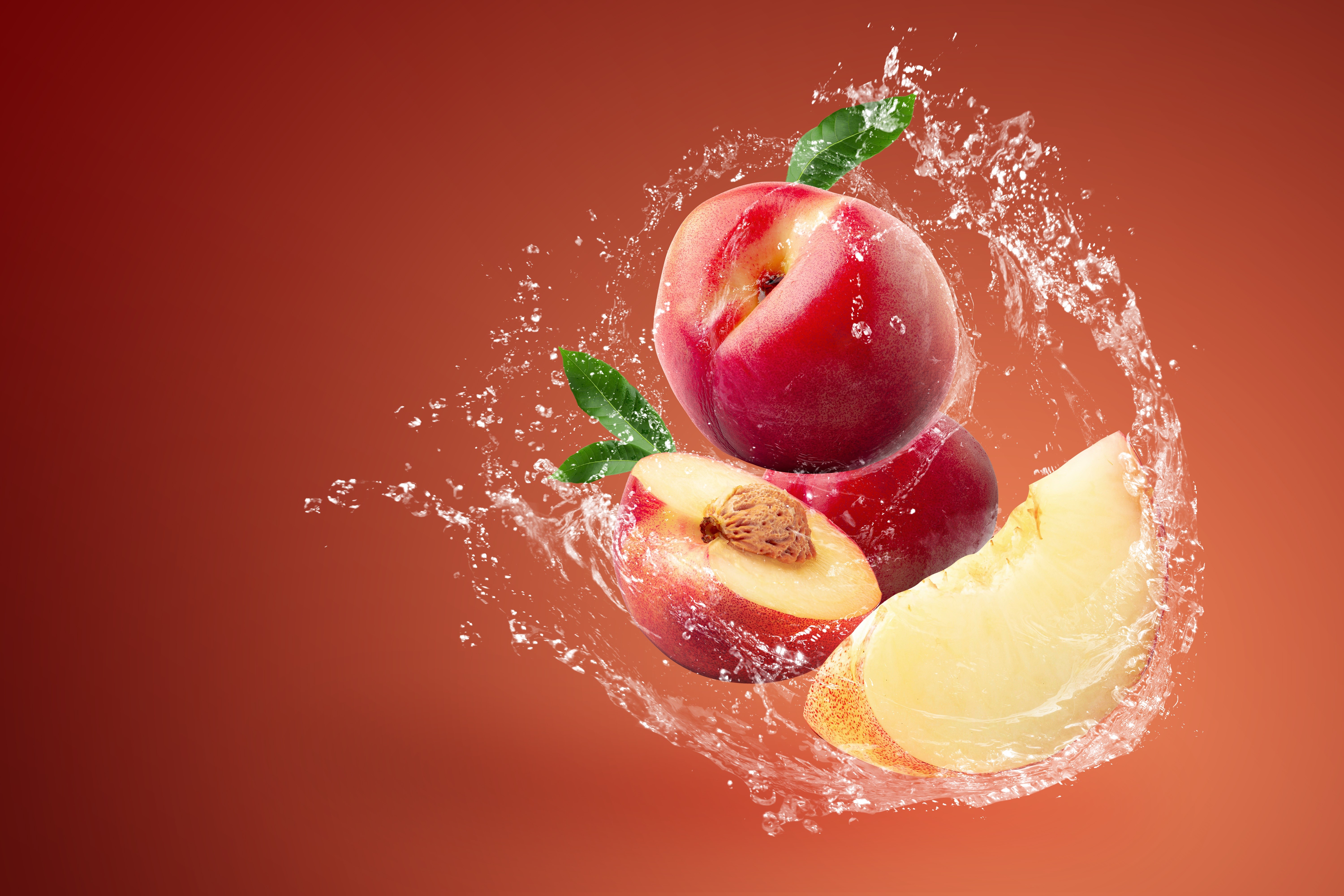 Peaches with Water Splash on Colored Background HD Wallpaper