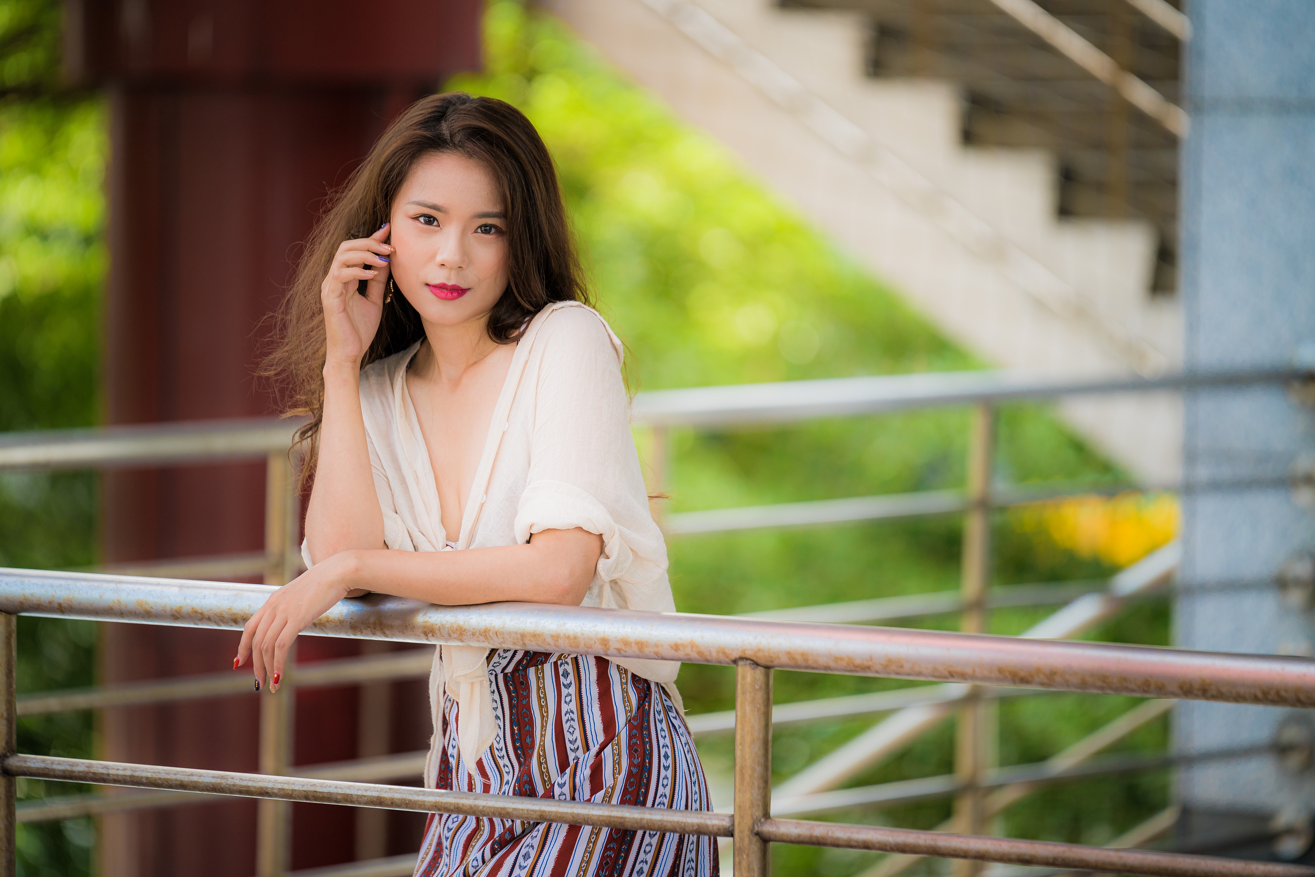 4K Asian Woman with Brown Hair and Bokeh HD Wallpaper