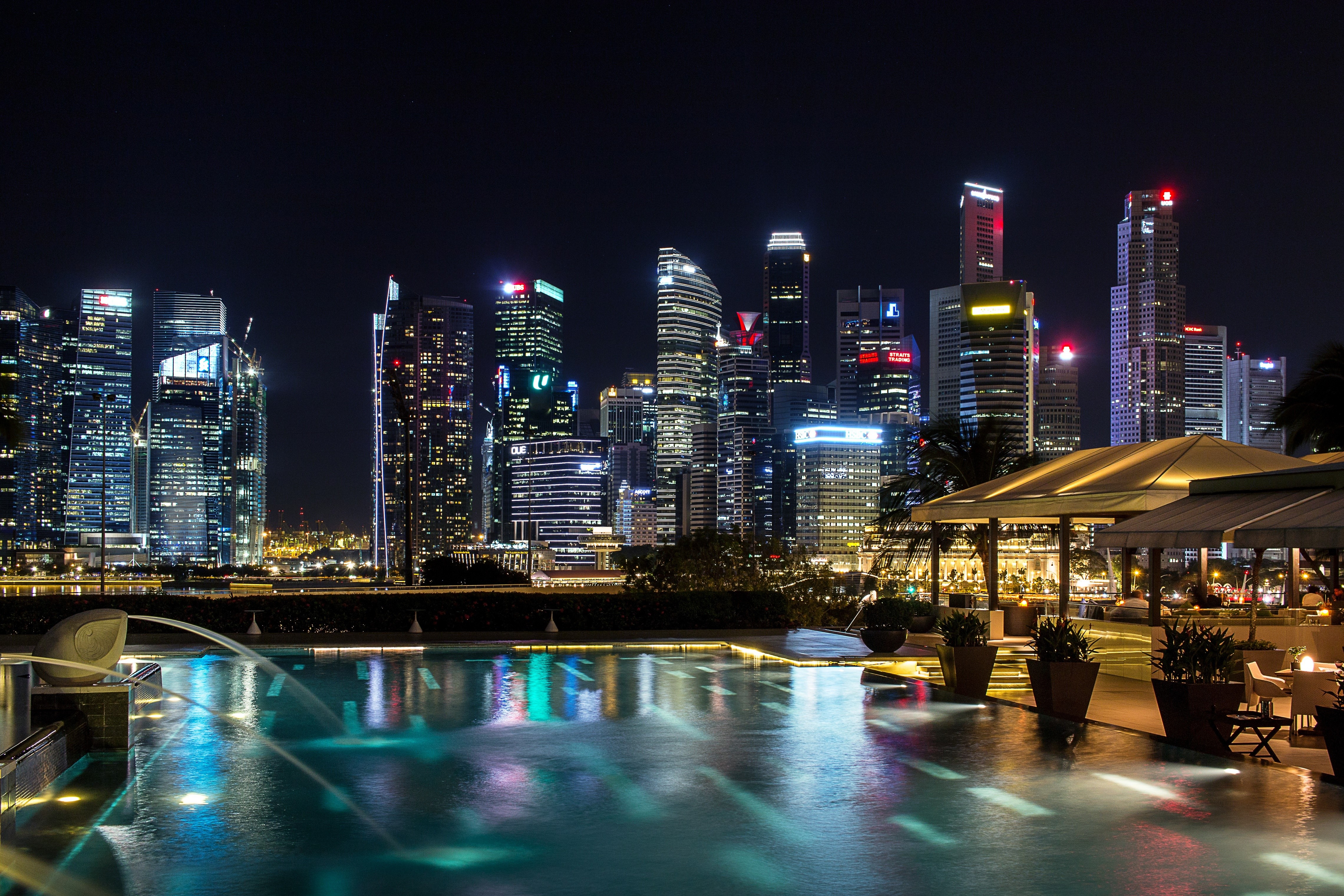 Singapore Skyline at Night with Pool HD Wallpaper