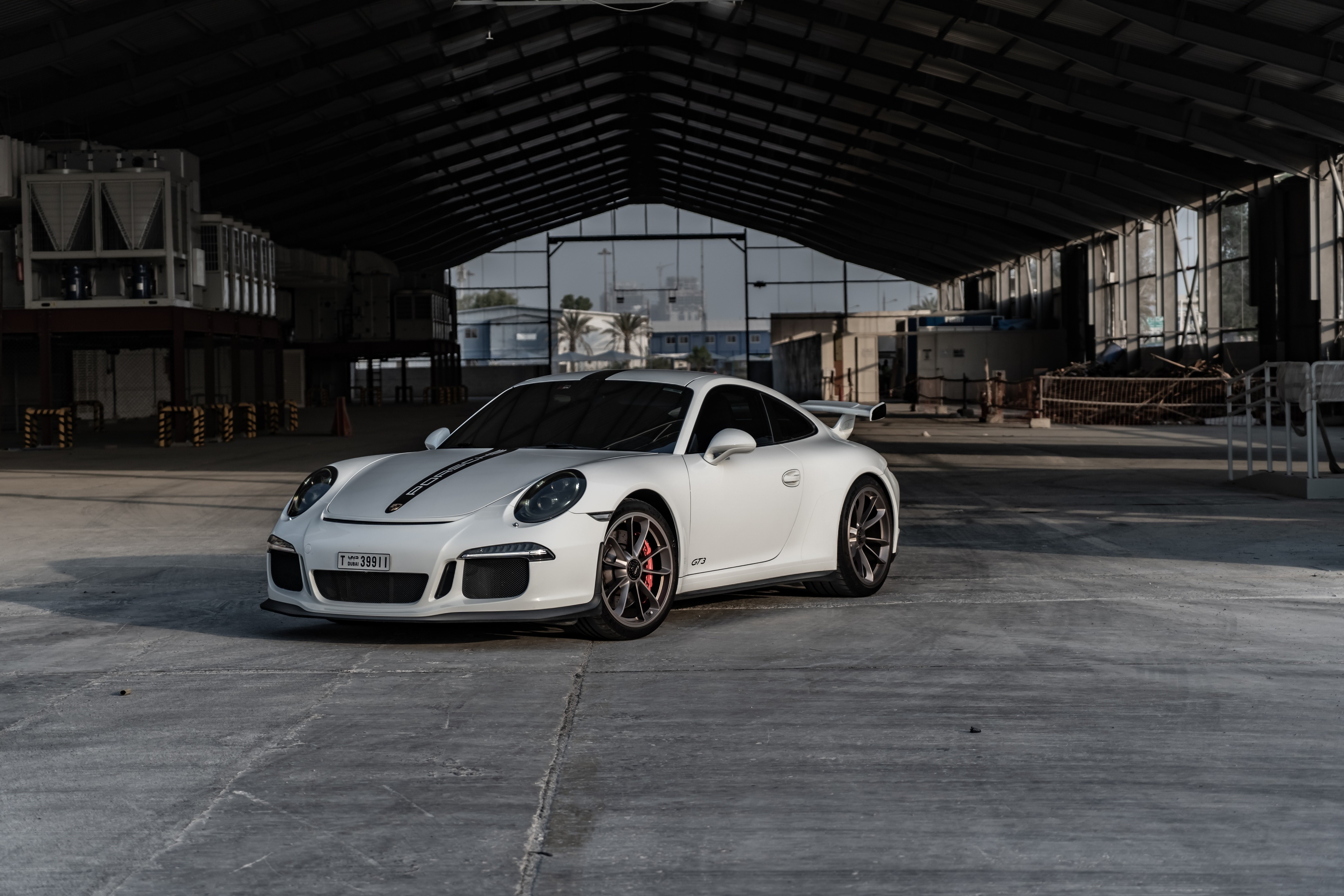White Porsche 911 GT3 RS in a warehouse HD Wallpaper