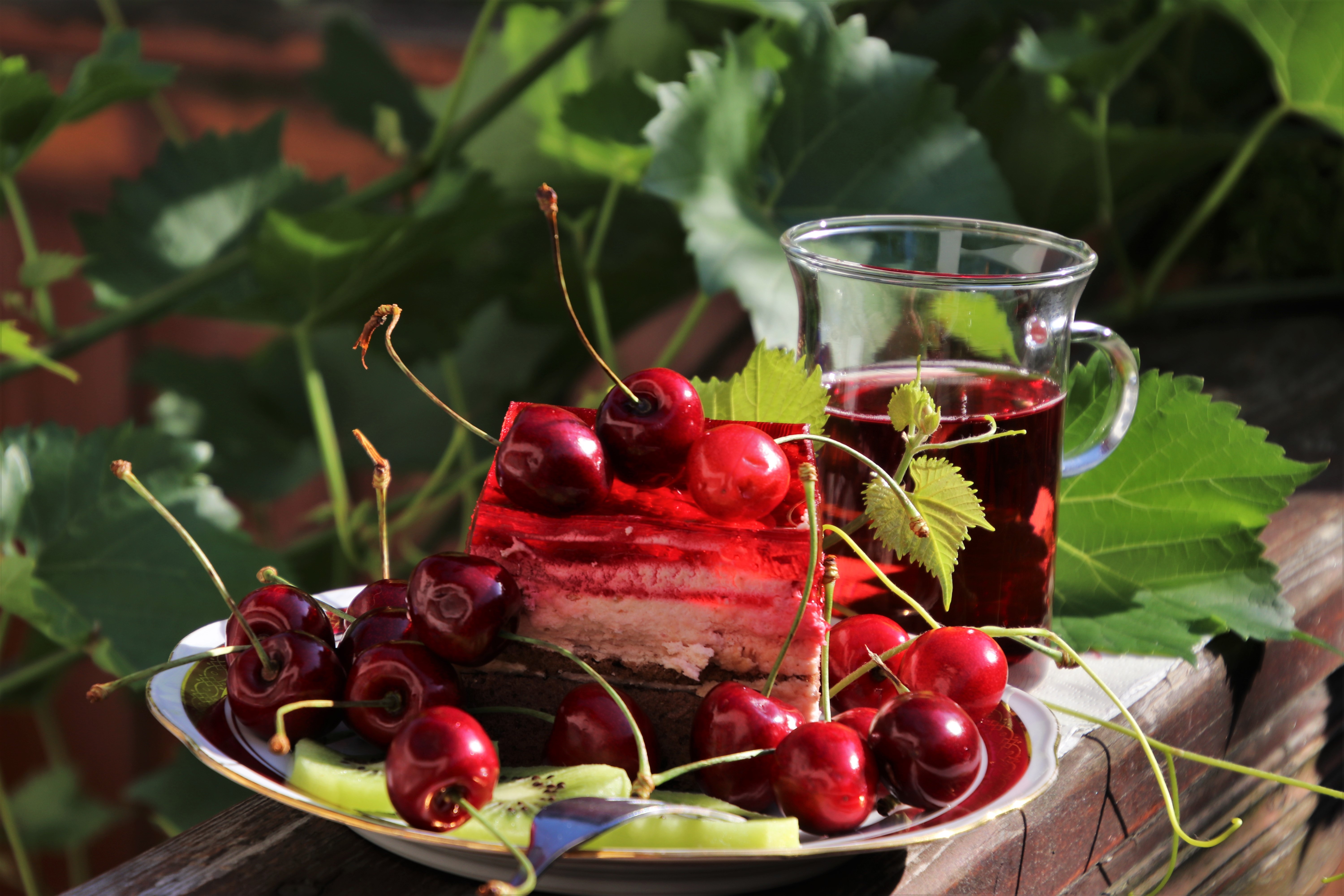 Dessert with cherries and juice HD Wallpaper
