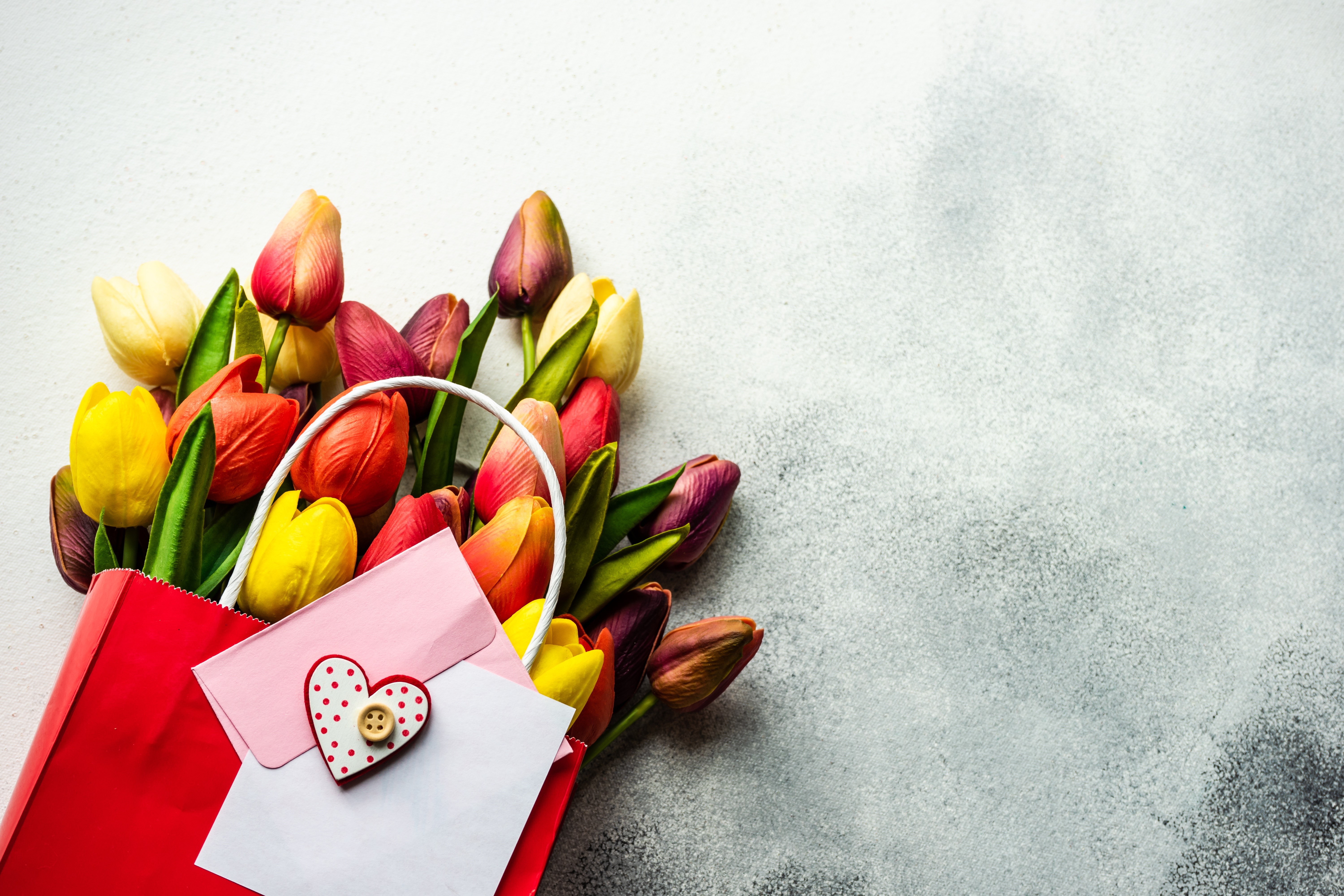Bouquet of Tulips in a Red Paper Bag with Greeting Card HD Wallpaper