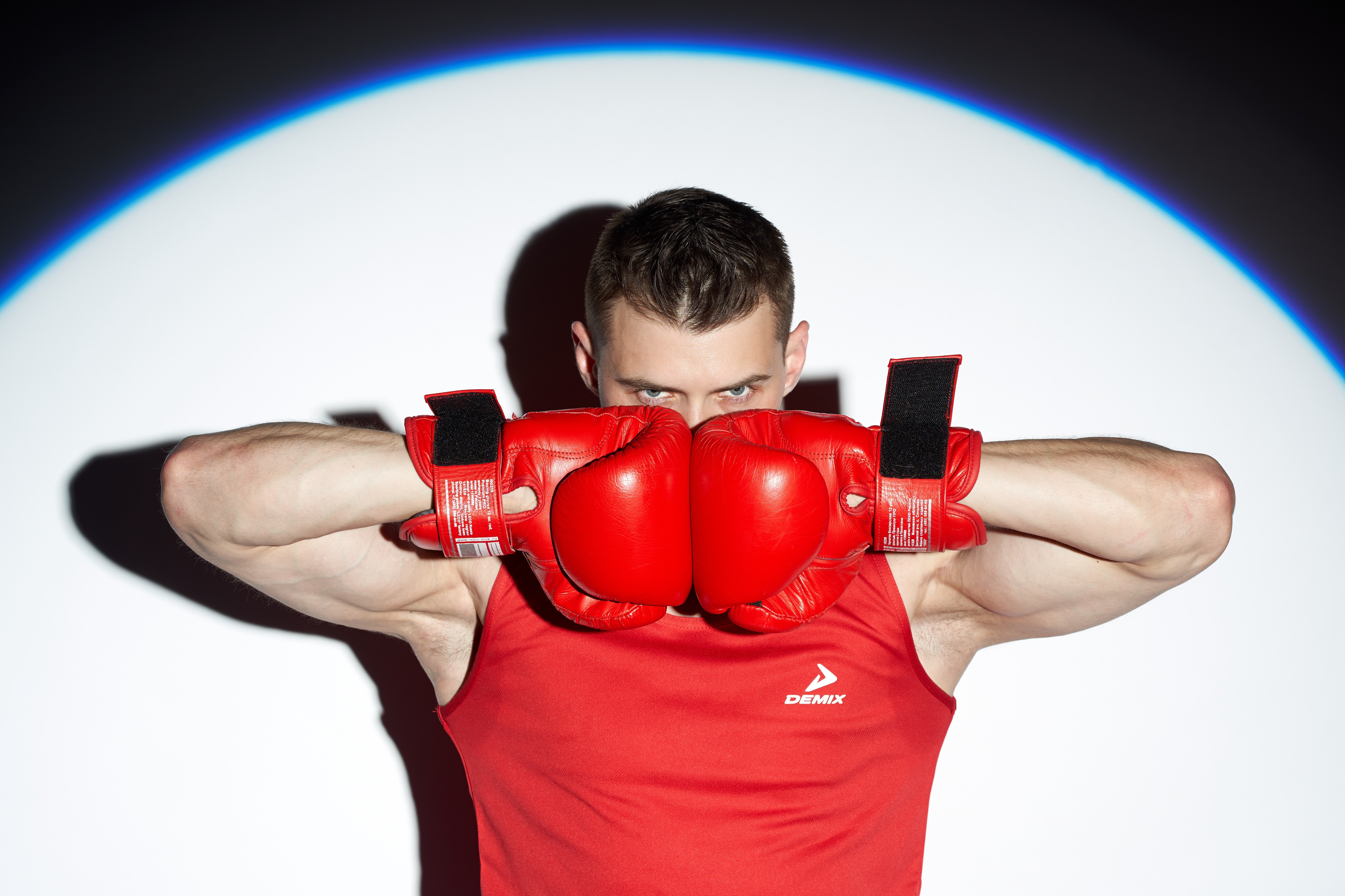 Man in red boxing gloves and tank top HD Wallpaper