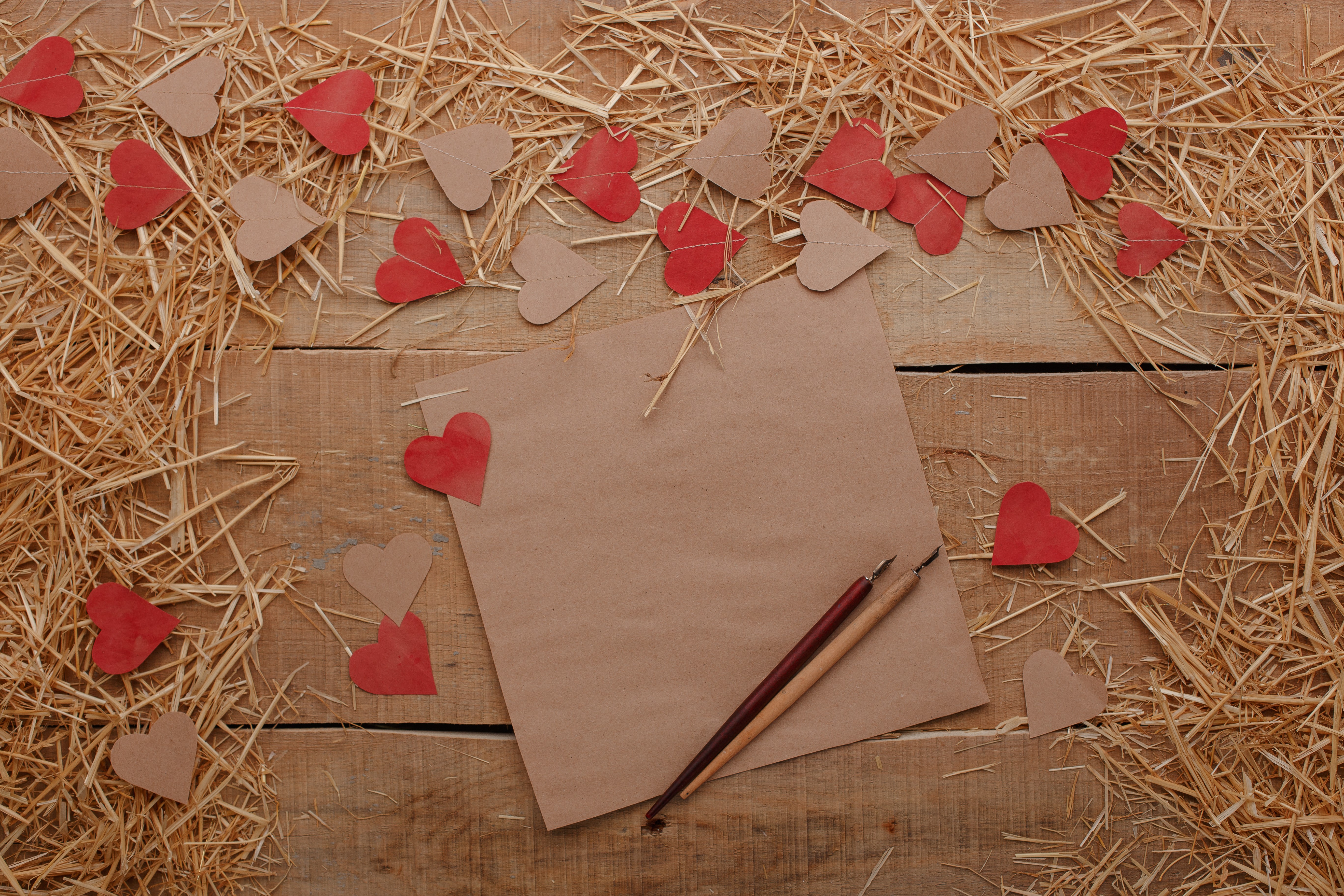 Valentine's Day hearts on wood with paper and pens HD Wallpaper