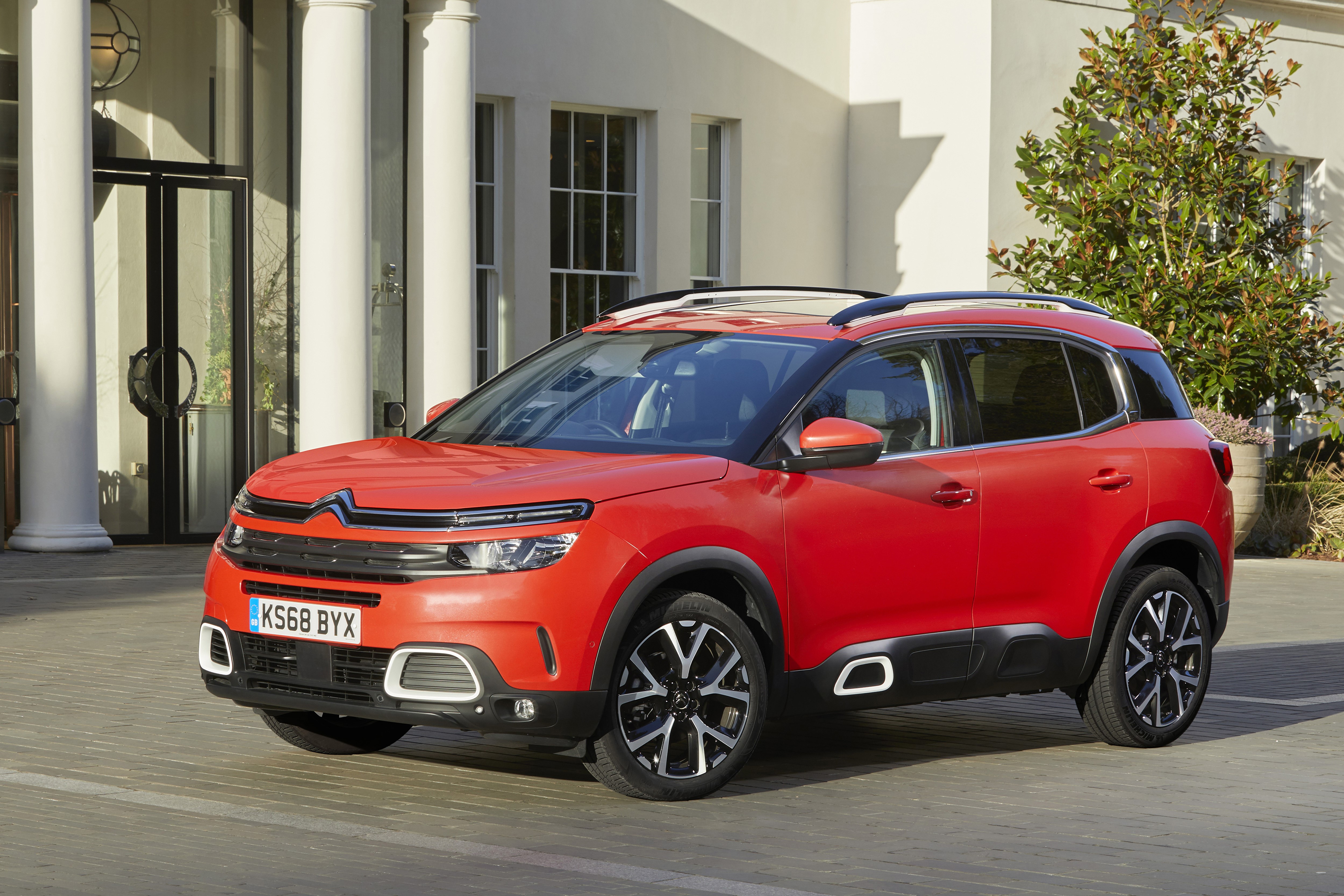 Red Citroen C5 Aircross parked outside building HD Wallpaper