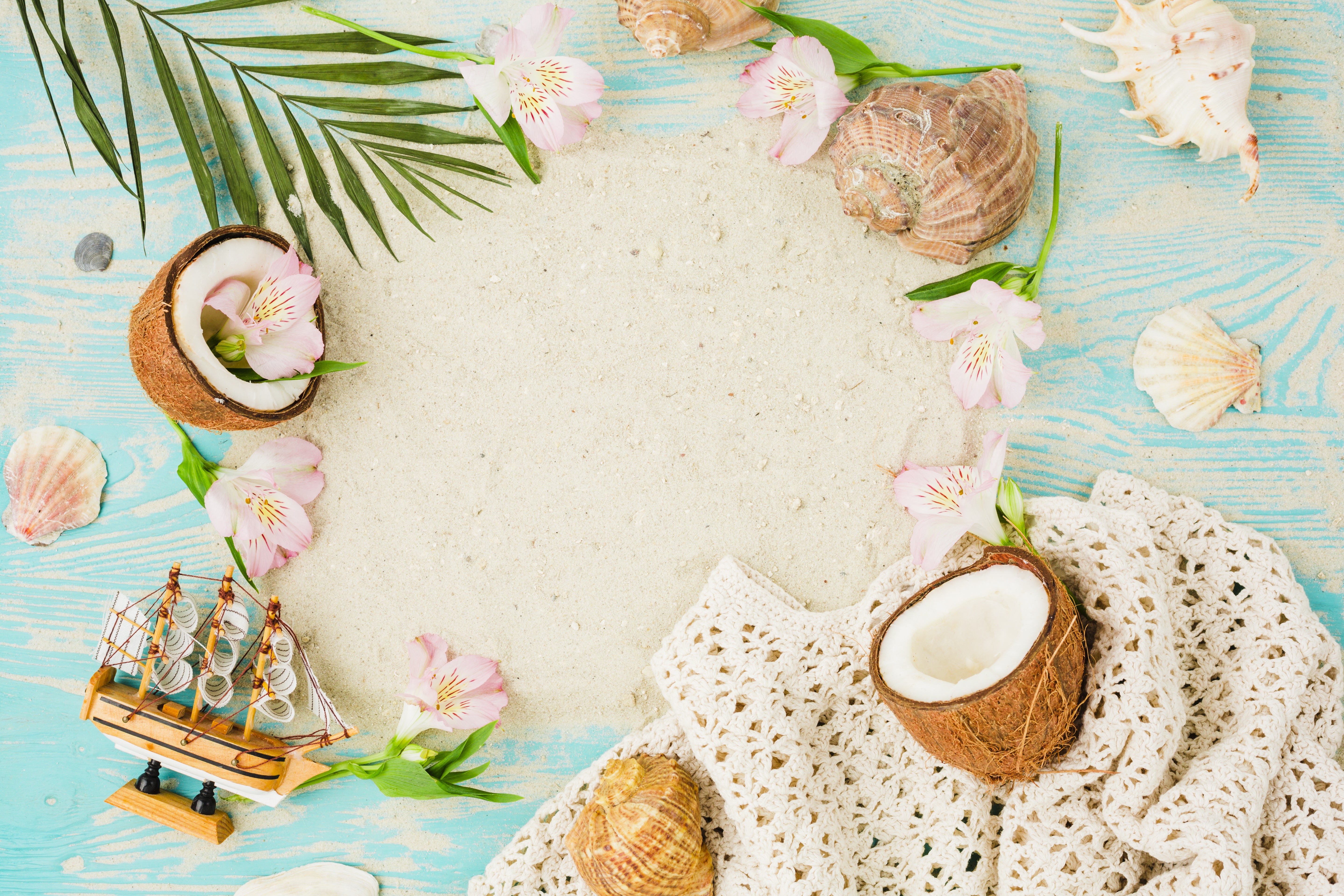Coconuts, Seashells, Flowers, and a Sailboat on Sand HD Wallpaper