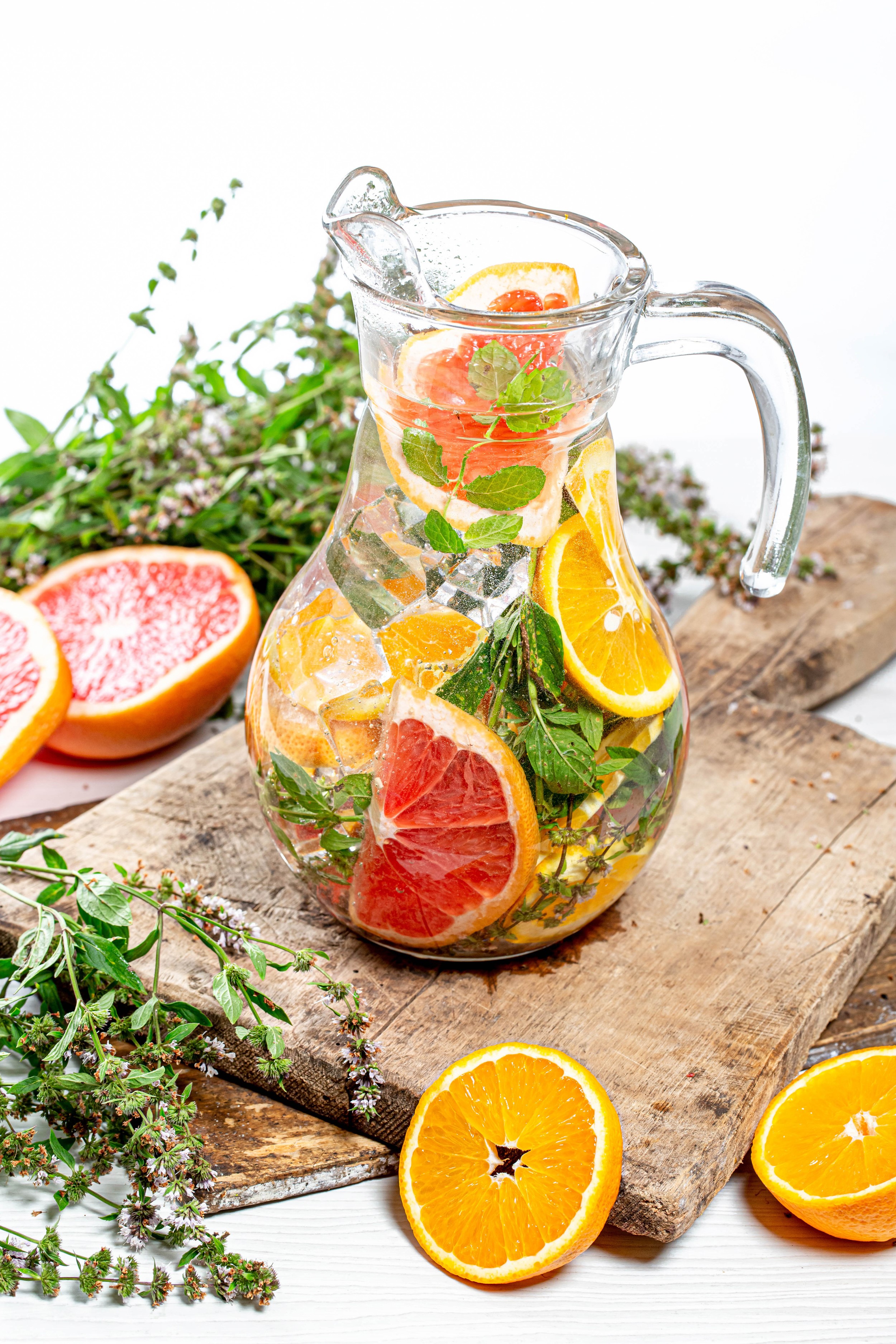 Pitcher of citrus fruit infused water with mint HD Phone Wallpaper