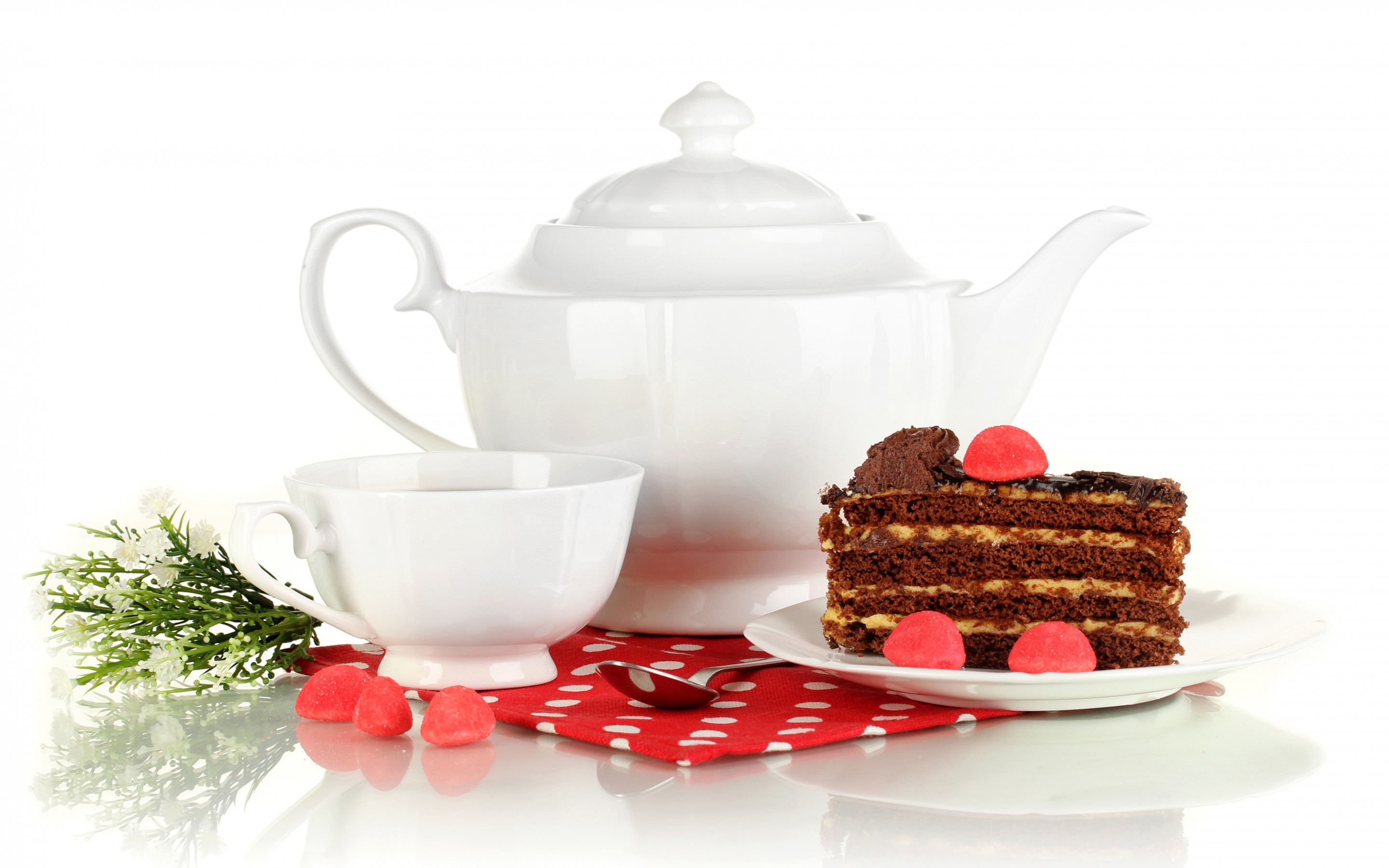 Tea set with chocolate cake and marmalade candies HD Wallpaper