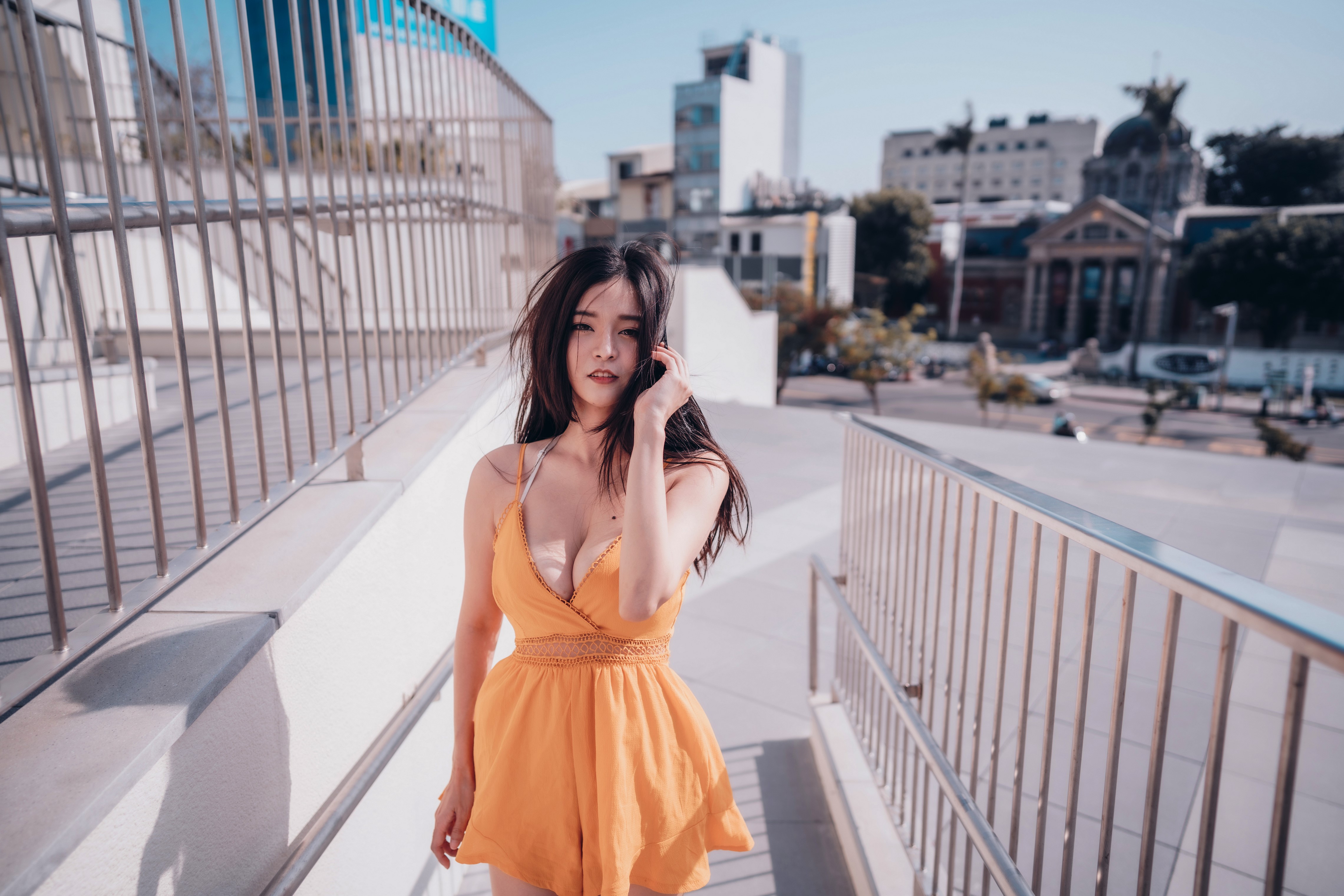 Asian woman in orange dress HD Wallpaper