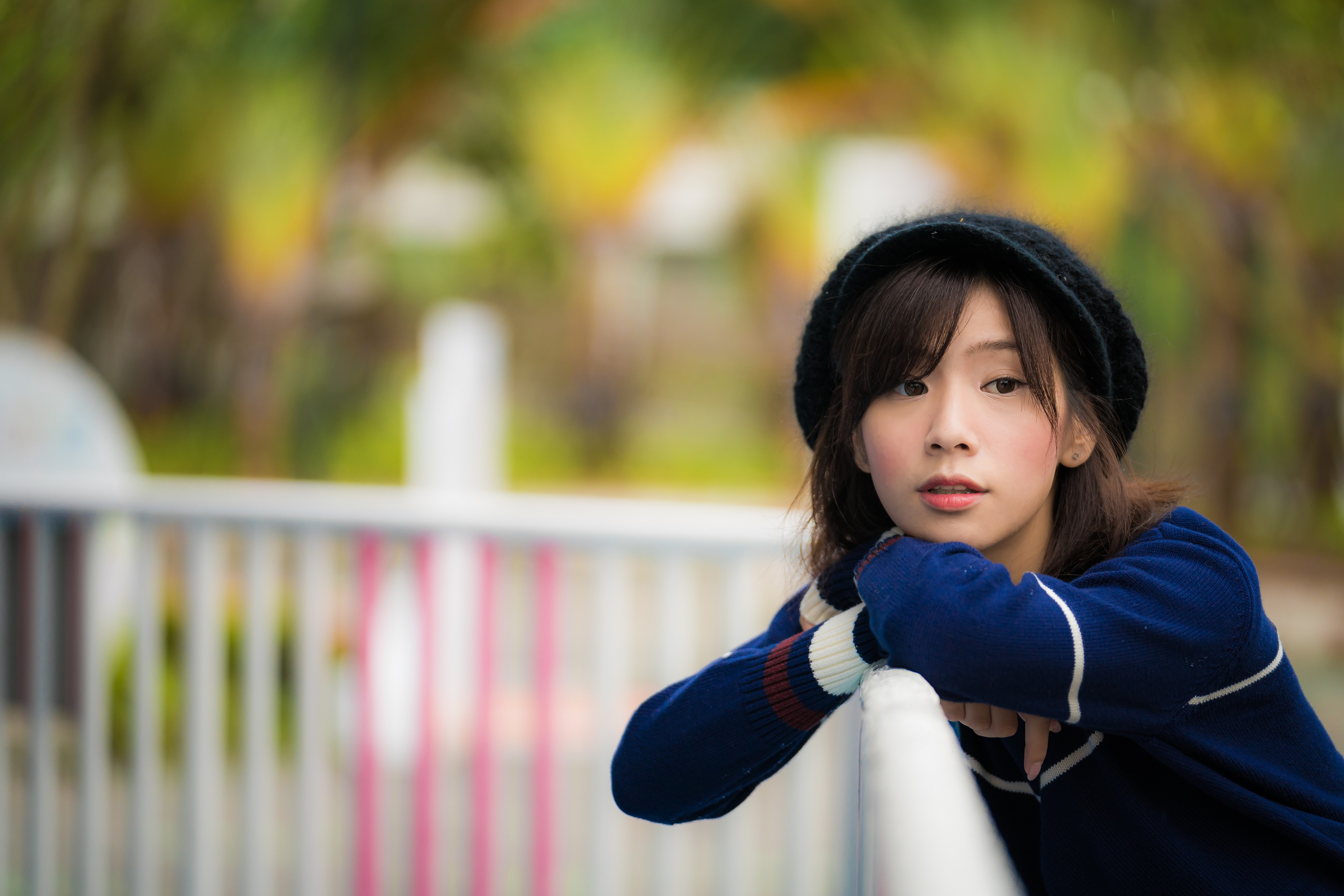 Asian girl in a blue sweater and black hat HD Wallpaper