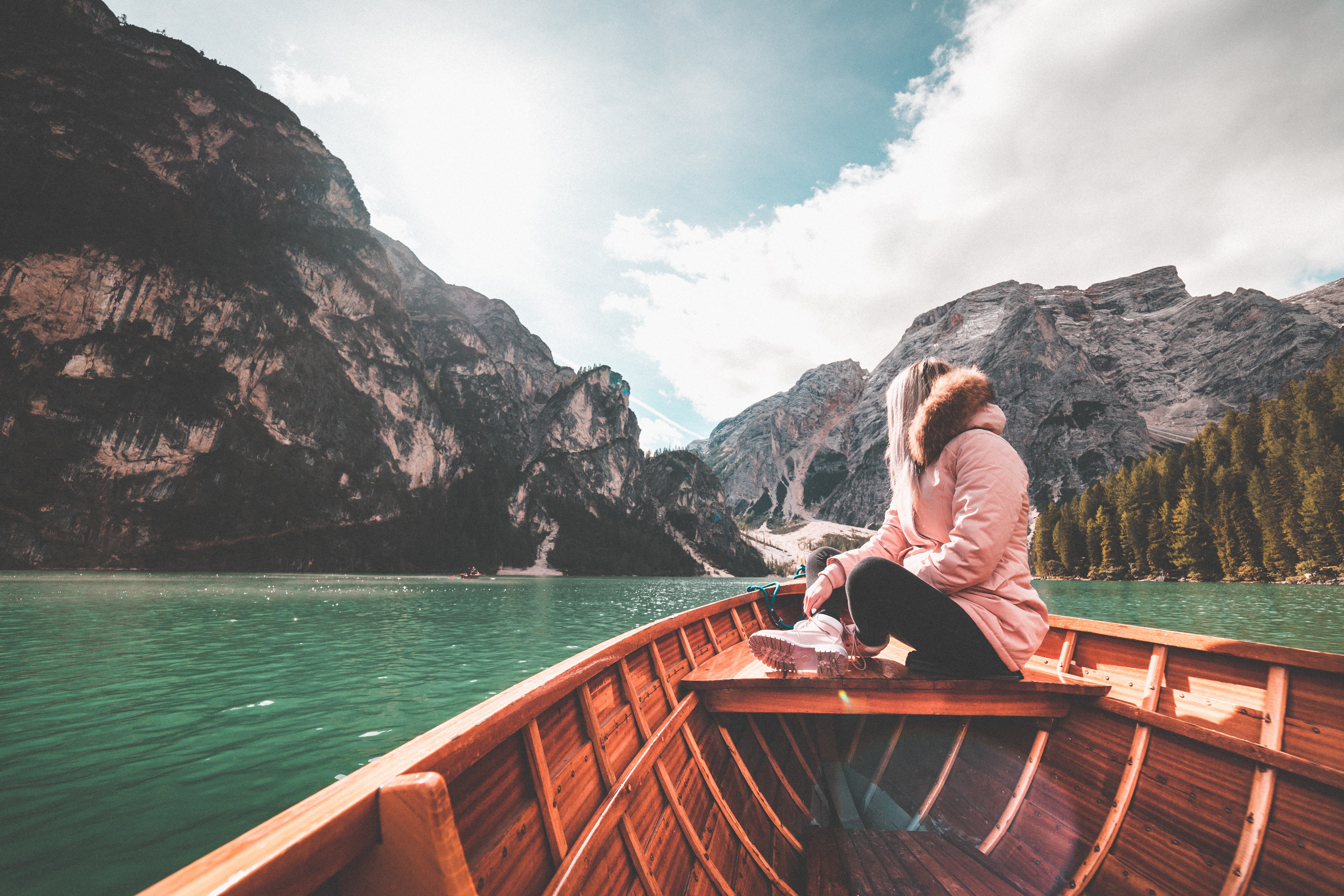 Woman in boat on Lake Braies, Italy HD Wallpaper