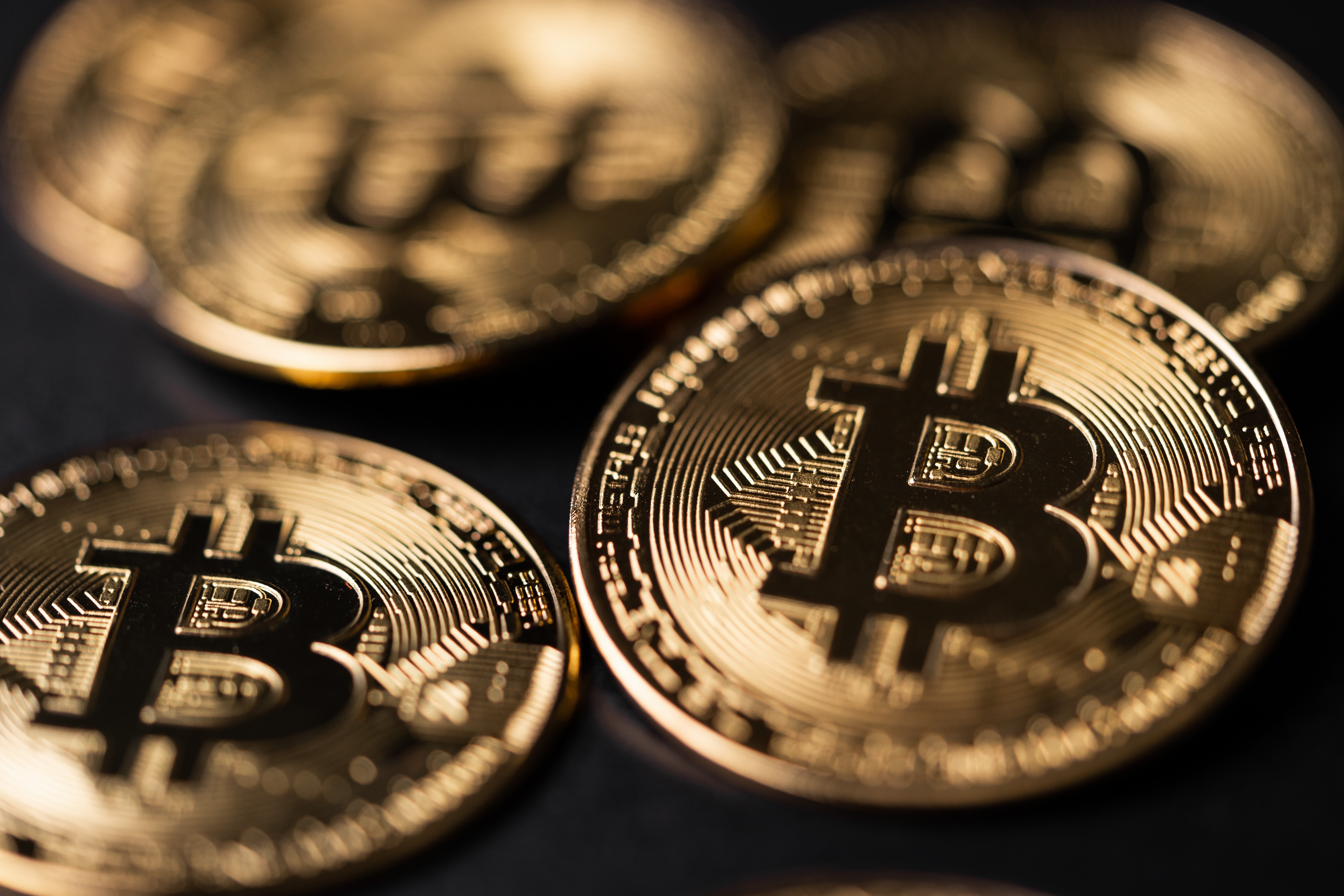Close-up of Bitcoin coins HD Wallpaper
