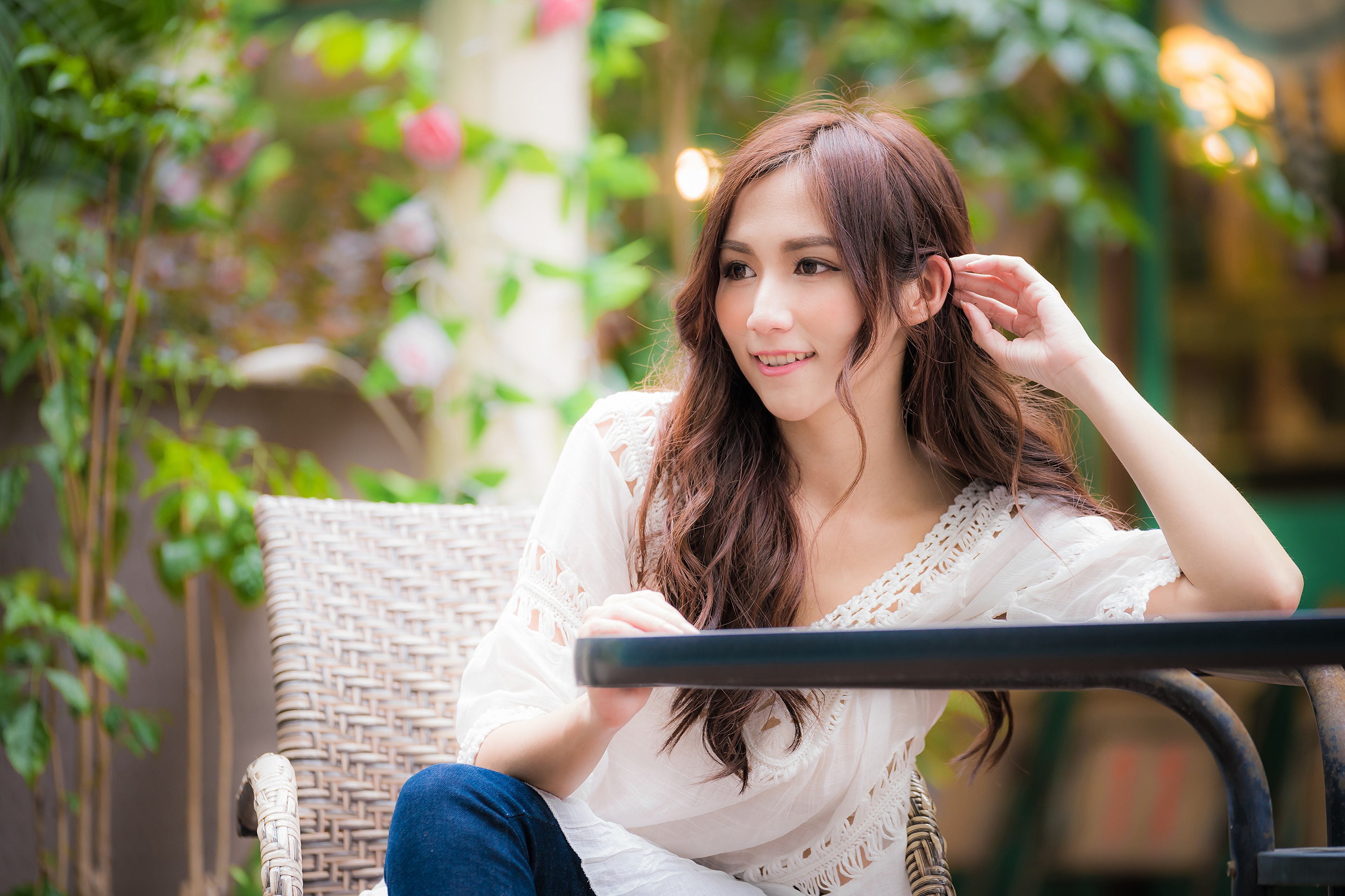 Asian woman with brown hair sitting outdoors HD Wallpaper