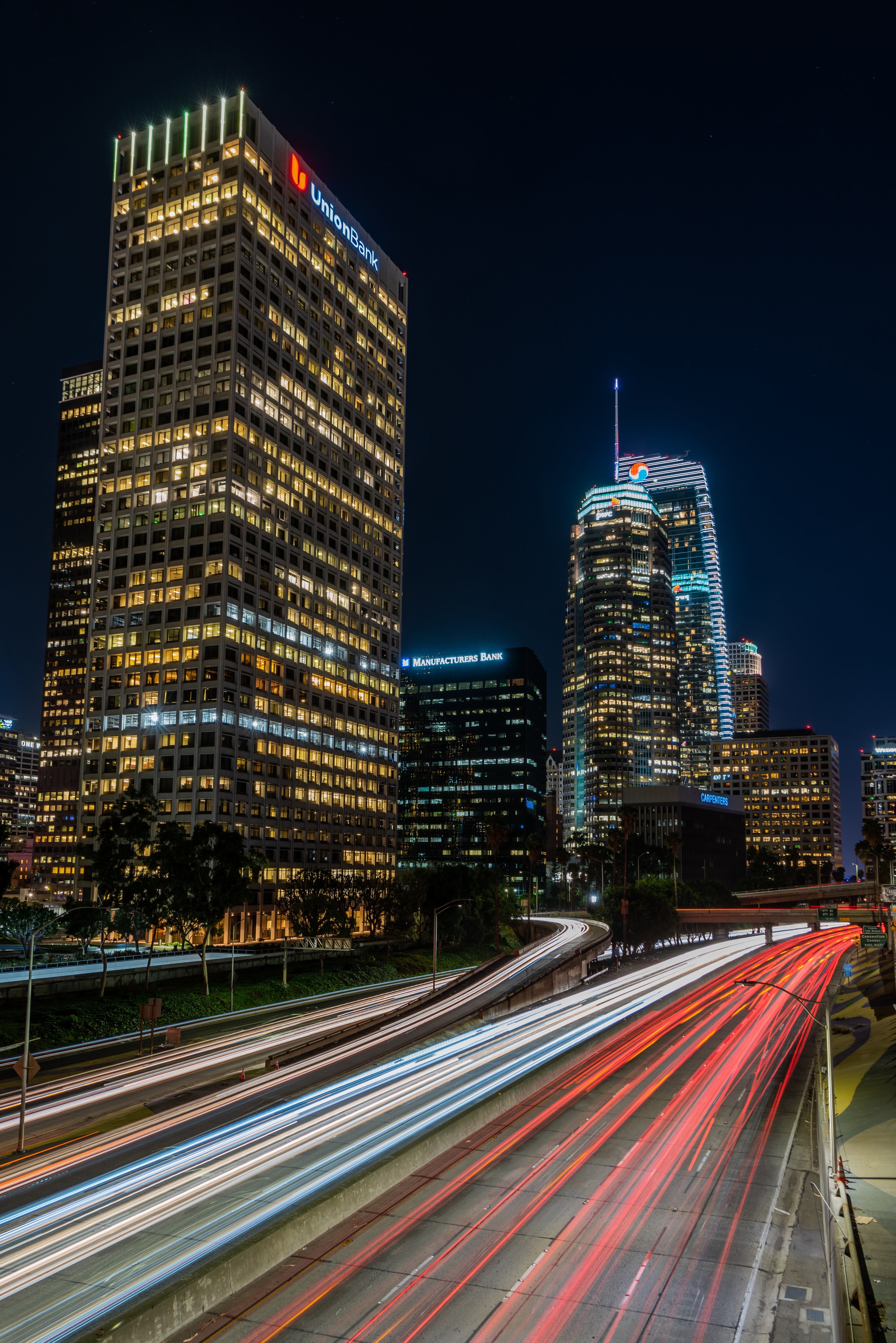 Los Angeles Skyscrapers and Highway at Night HD Phone Wallpaper