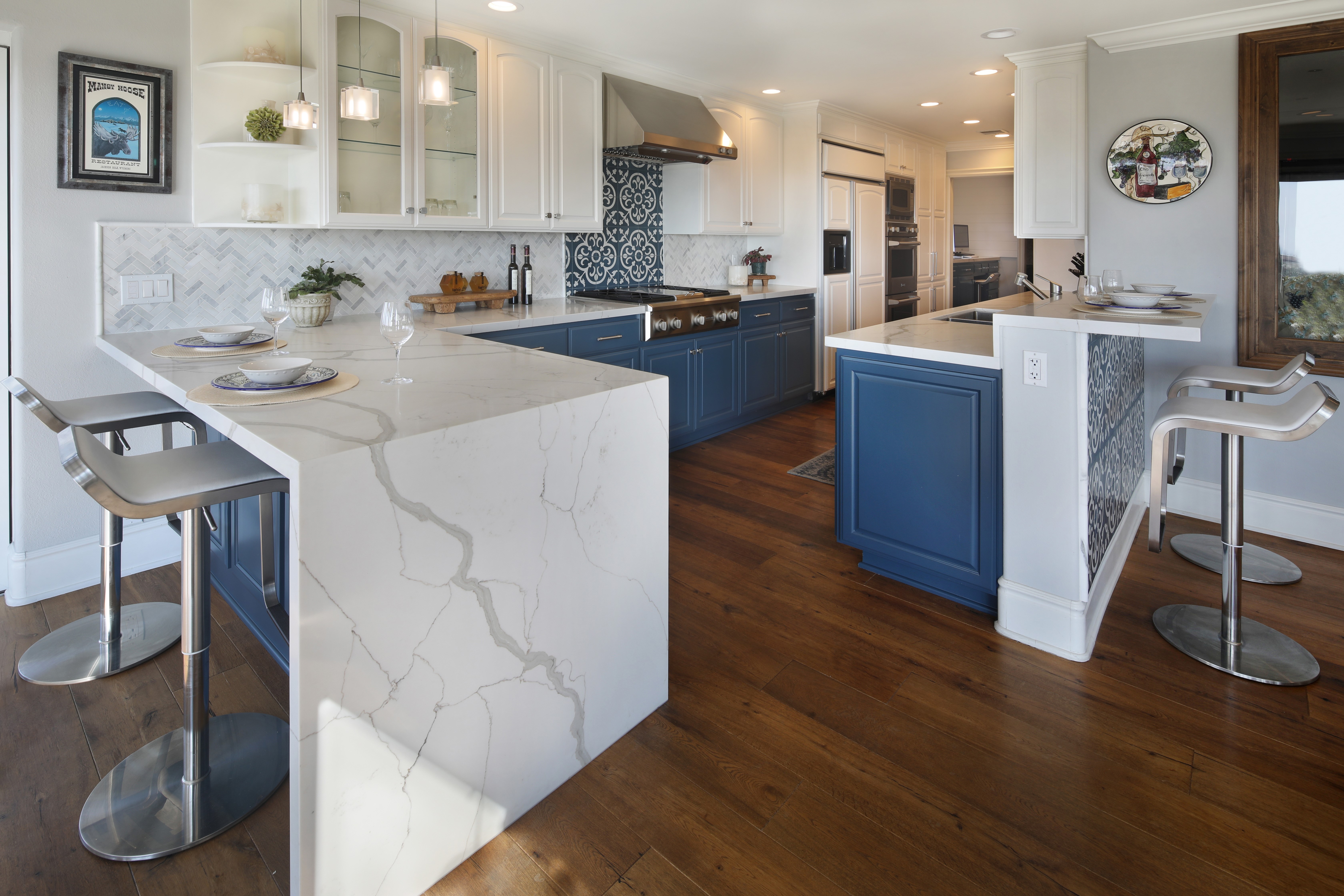 Modern Kitchen with Blue Cabinets and Marble Countertops HD Wallpaper