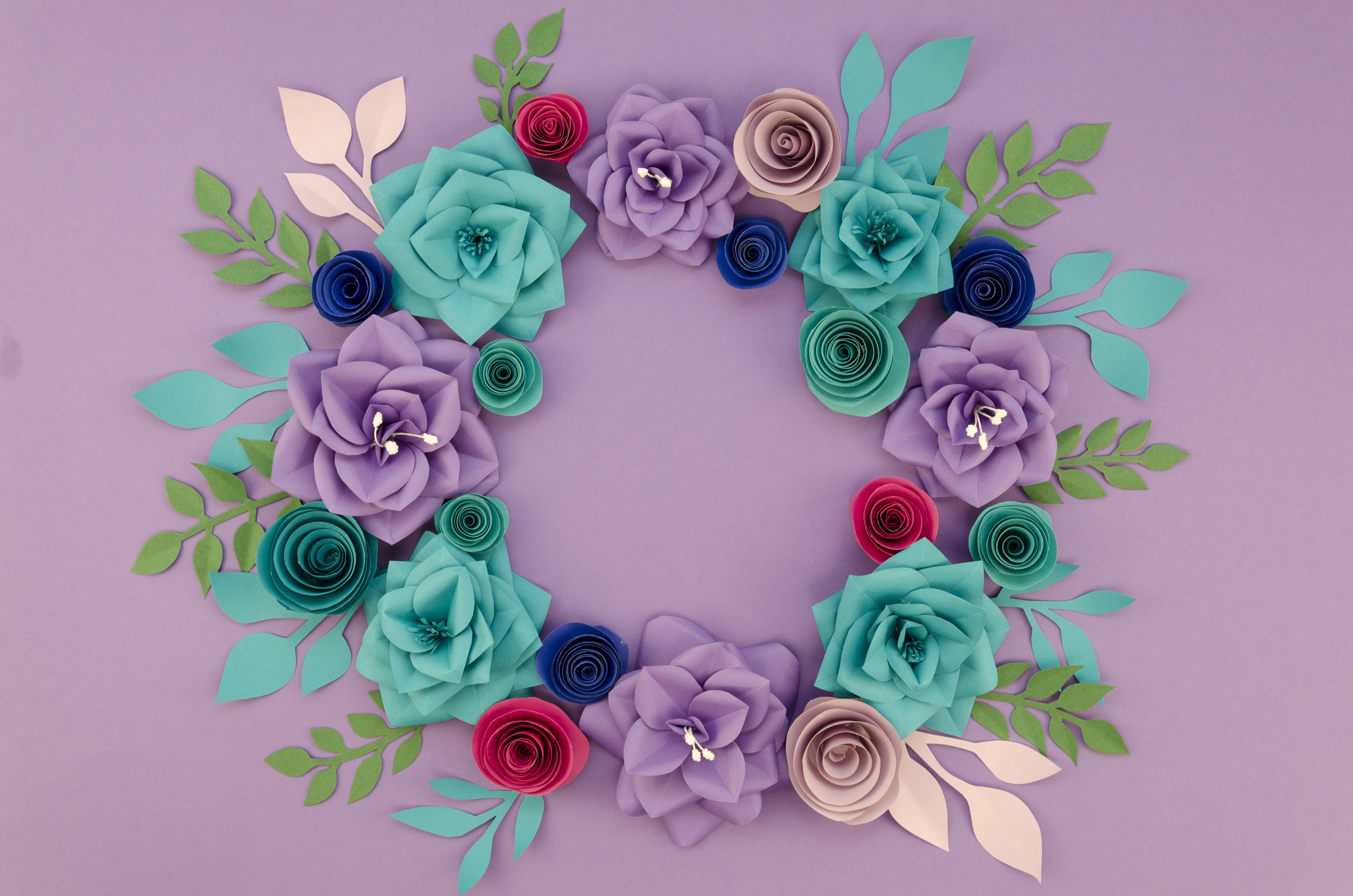 Paper flowers wreath on a colored background HD Wallpaper