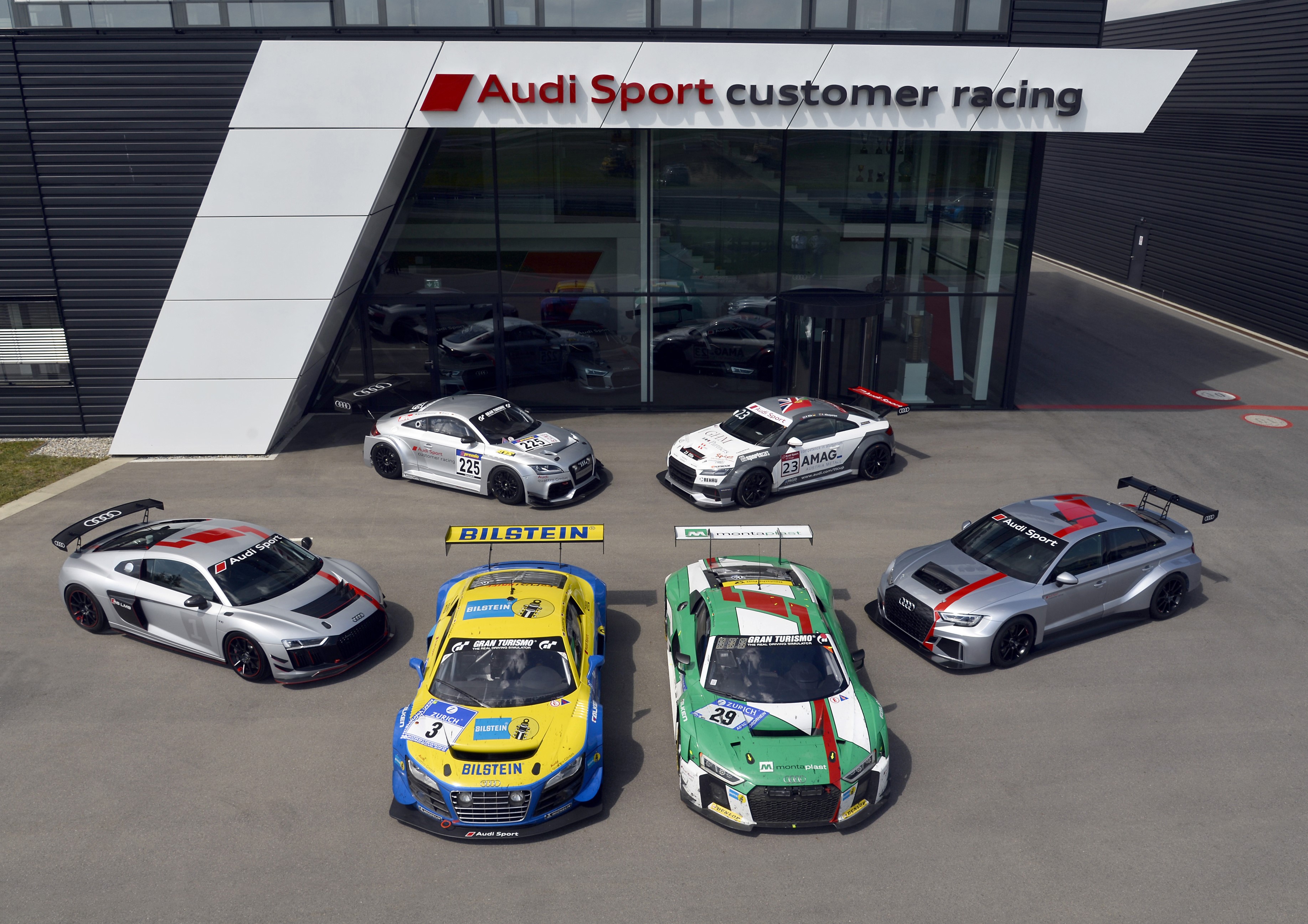 Audi Sport customer racing cars outside building HD Wallpaper