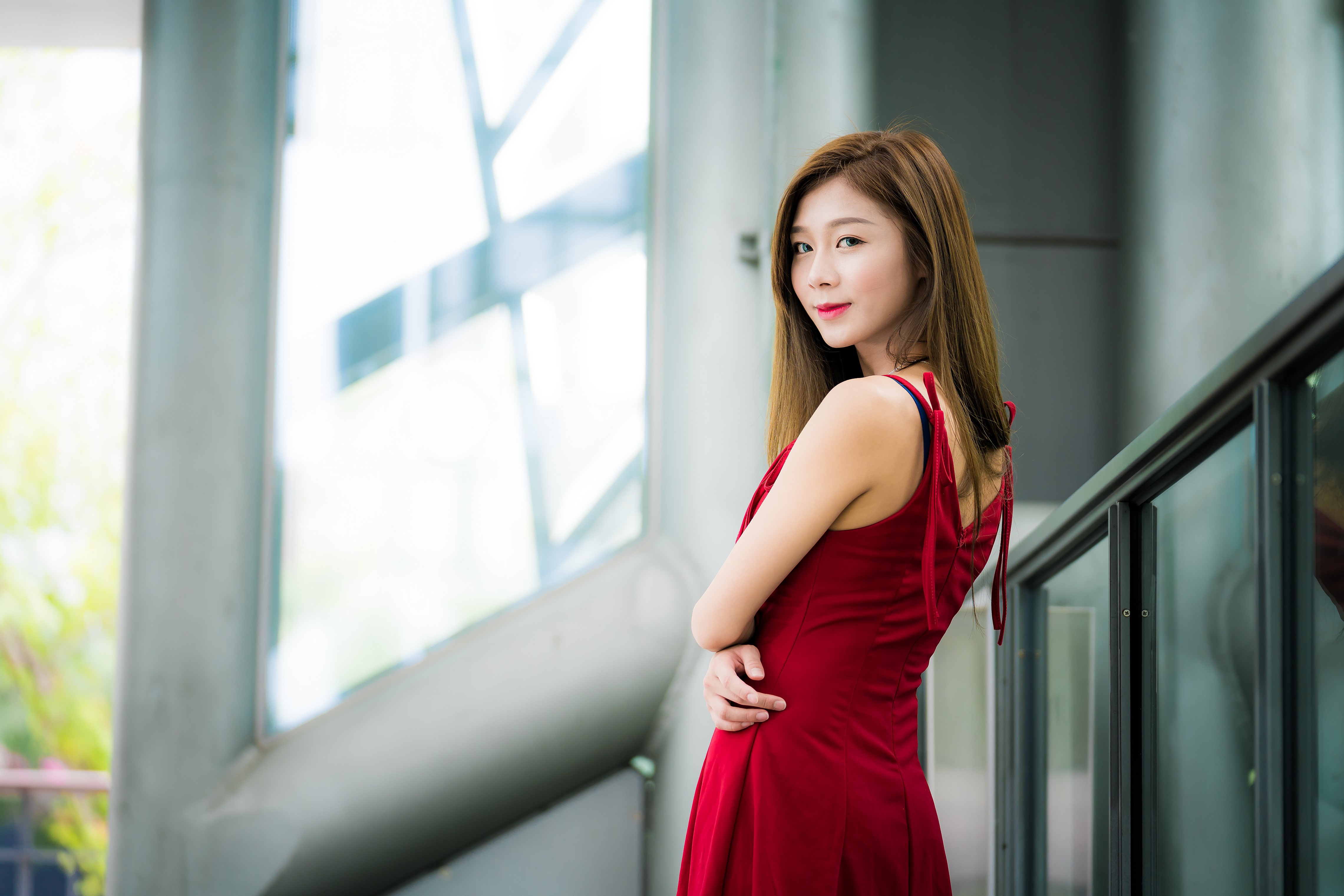 Asian woman with brown hair in a red dress HD Wallpaper