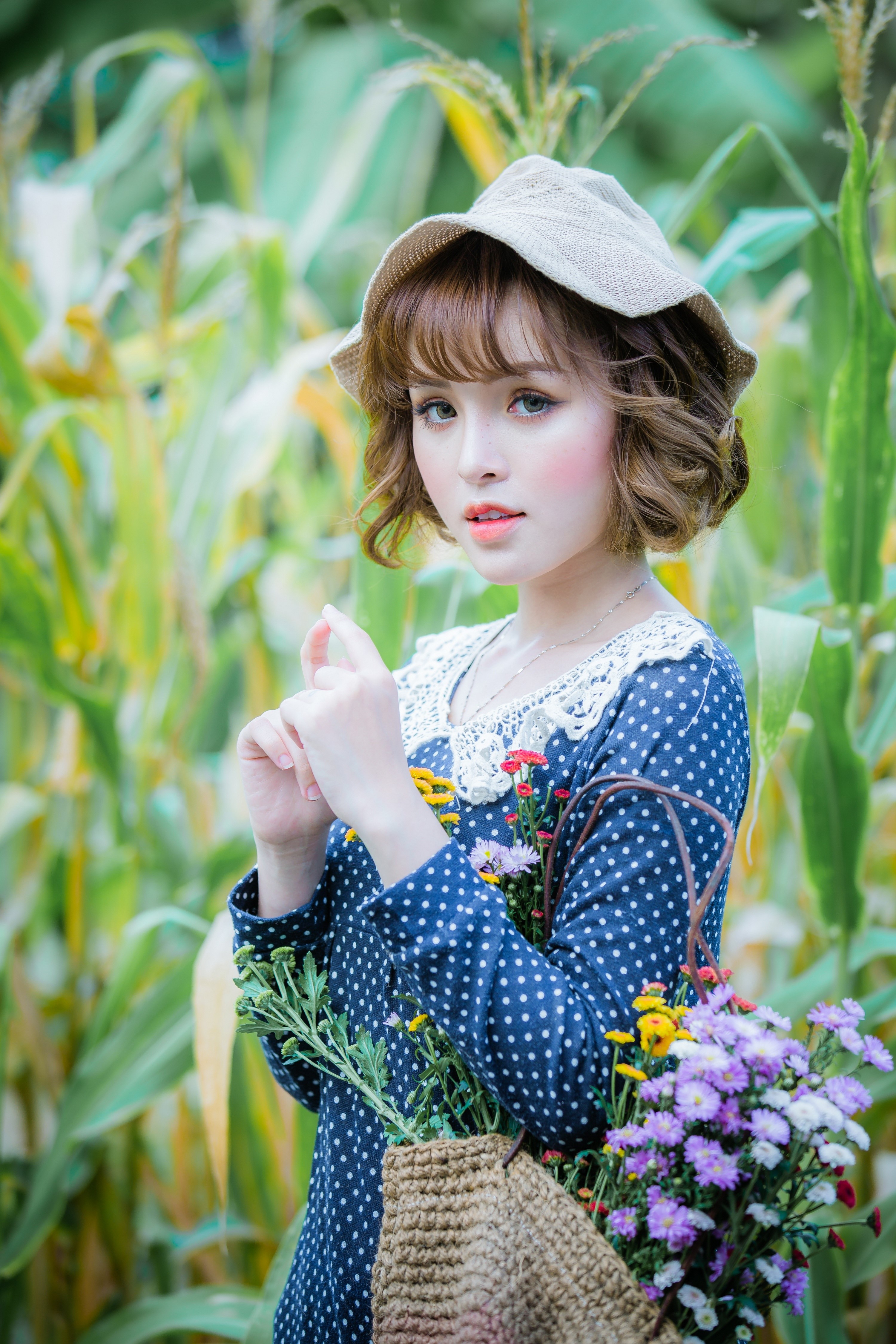 Cute Asian girl in a polka dot dress and hat HD Phone Wallpaper