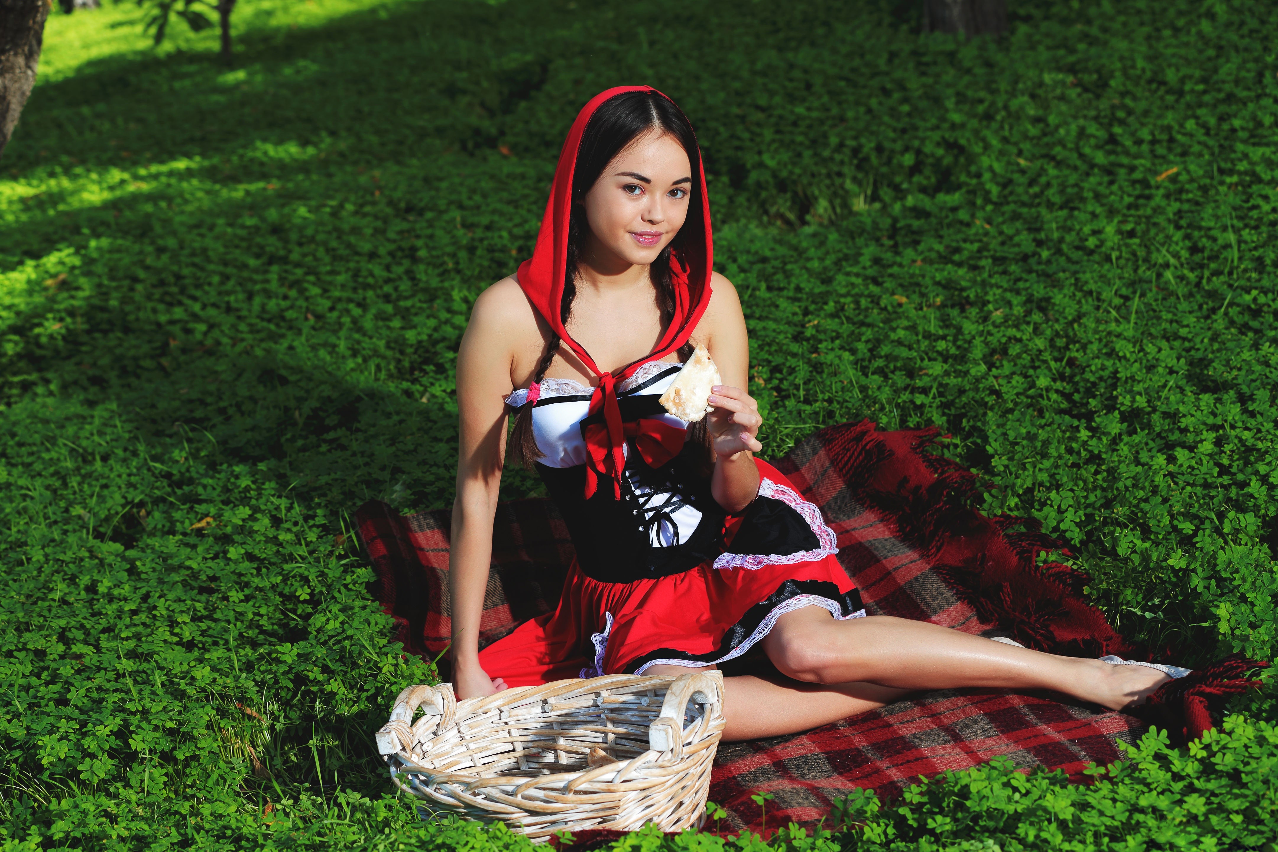 4K Li Moon as Red Riding Hood Sitting on Grass HD Wallpaper