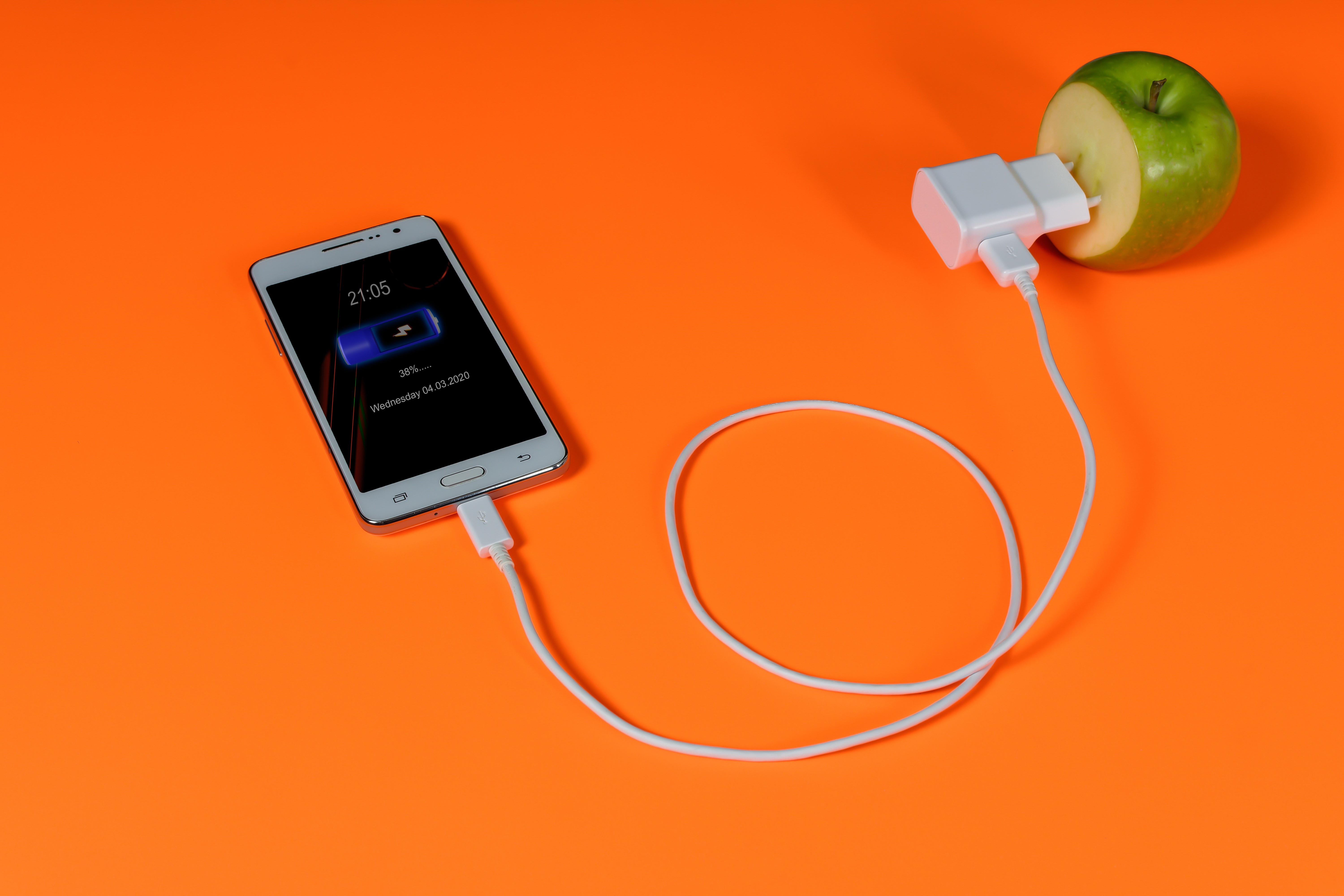 Smartphone charging with apple and charger HD Wallpaper