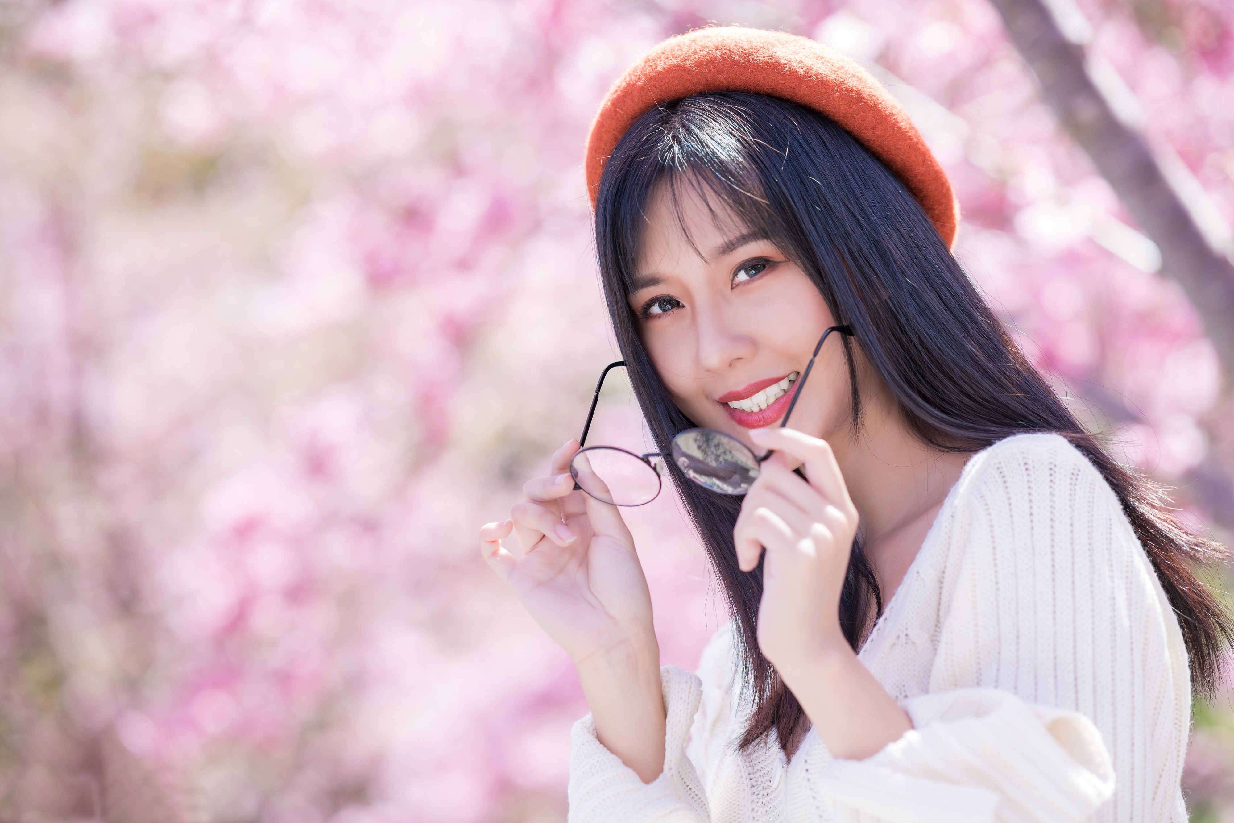 Asian girl with glasses and beret smiling HD Wallpaper