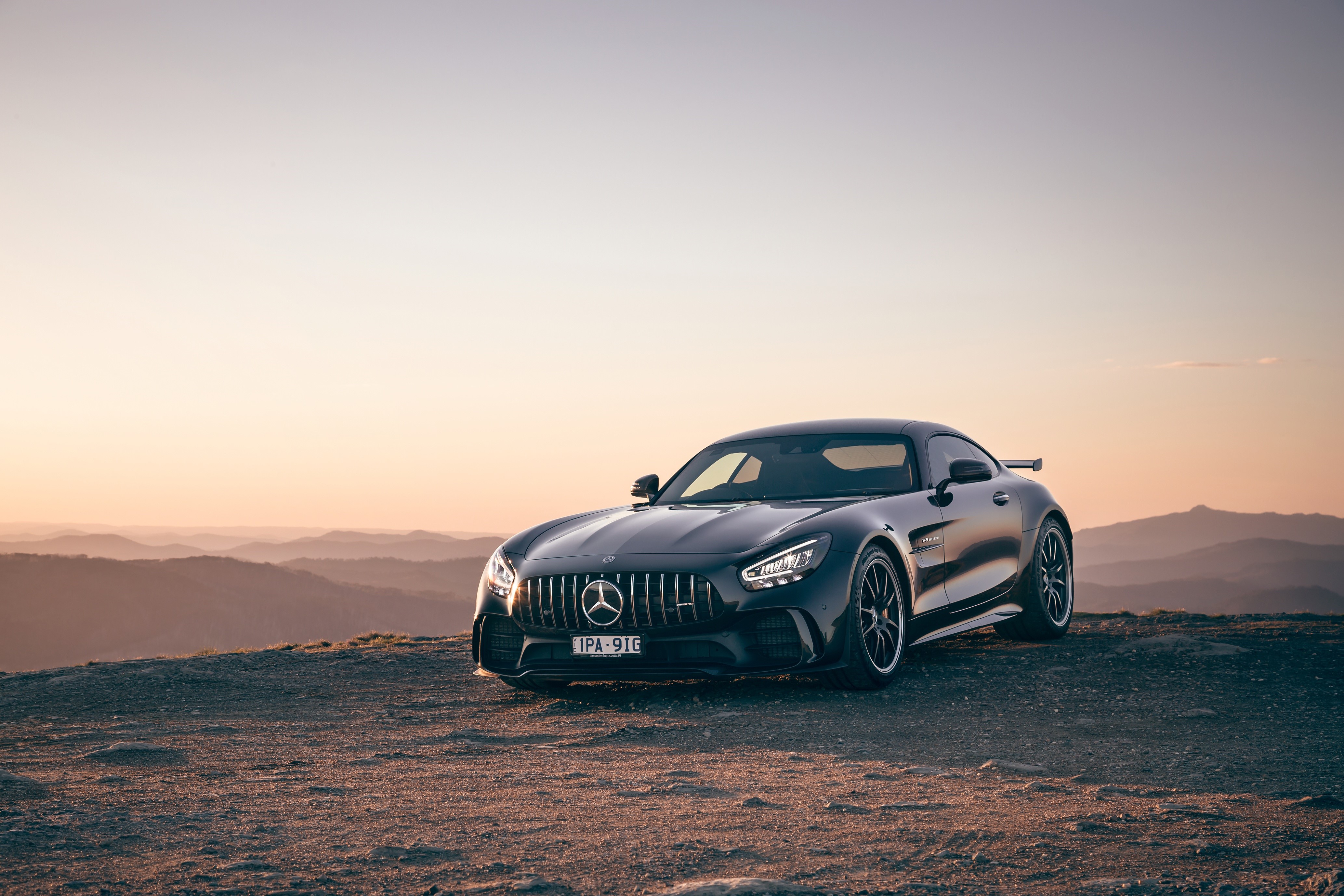 Black Mercedes-Benz GT R Coupe on Mountain Overlook at Sunset HD Wallpaper