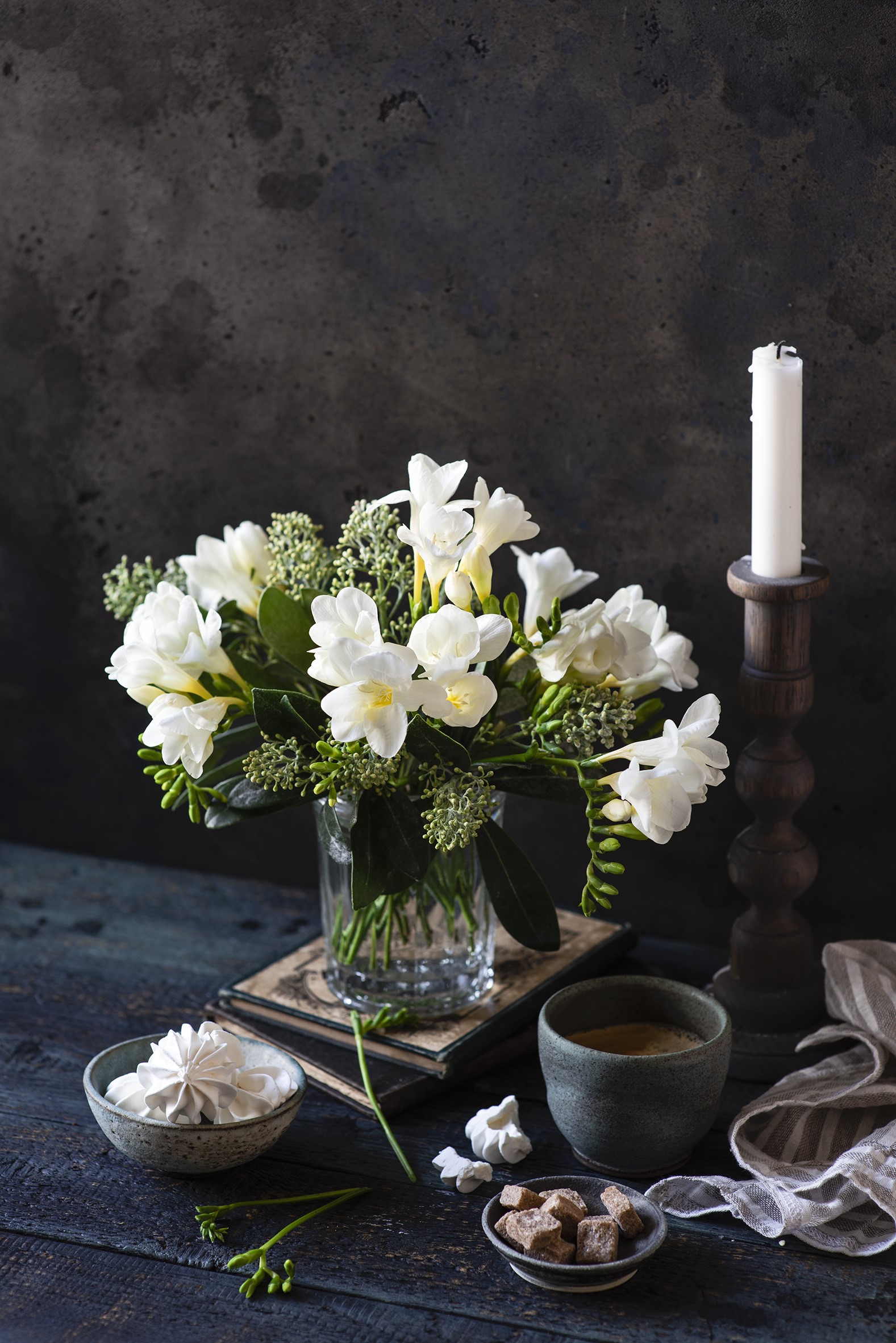 White Freesia flowers in a vase with coffee and sugar cubes HD Phone Wallpaper