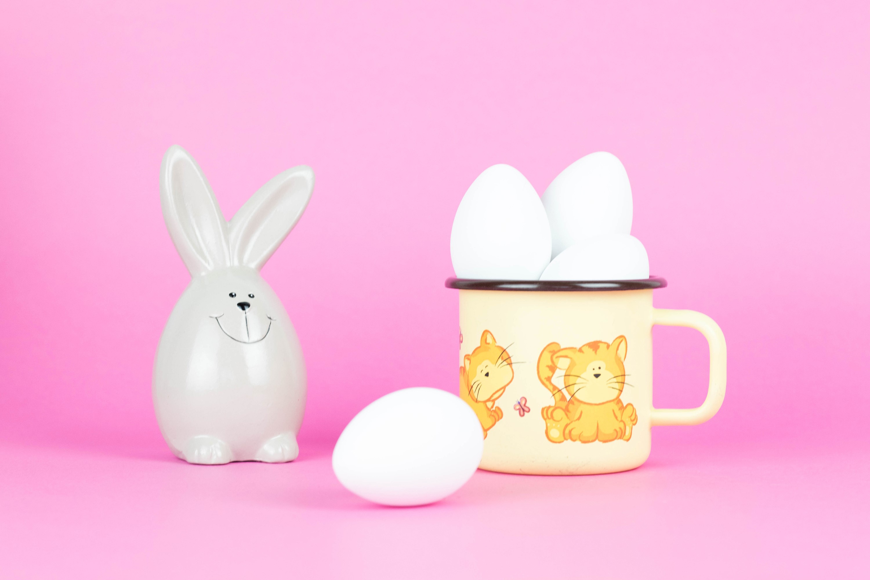 Easter bunny figurine with eggs in a mug HD Wallpaper