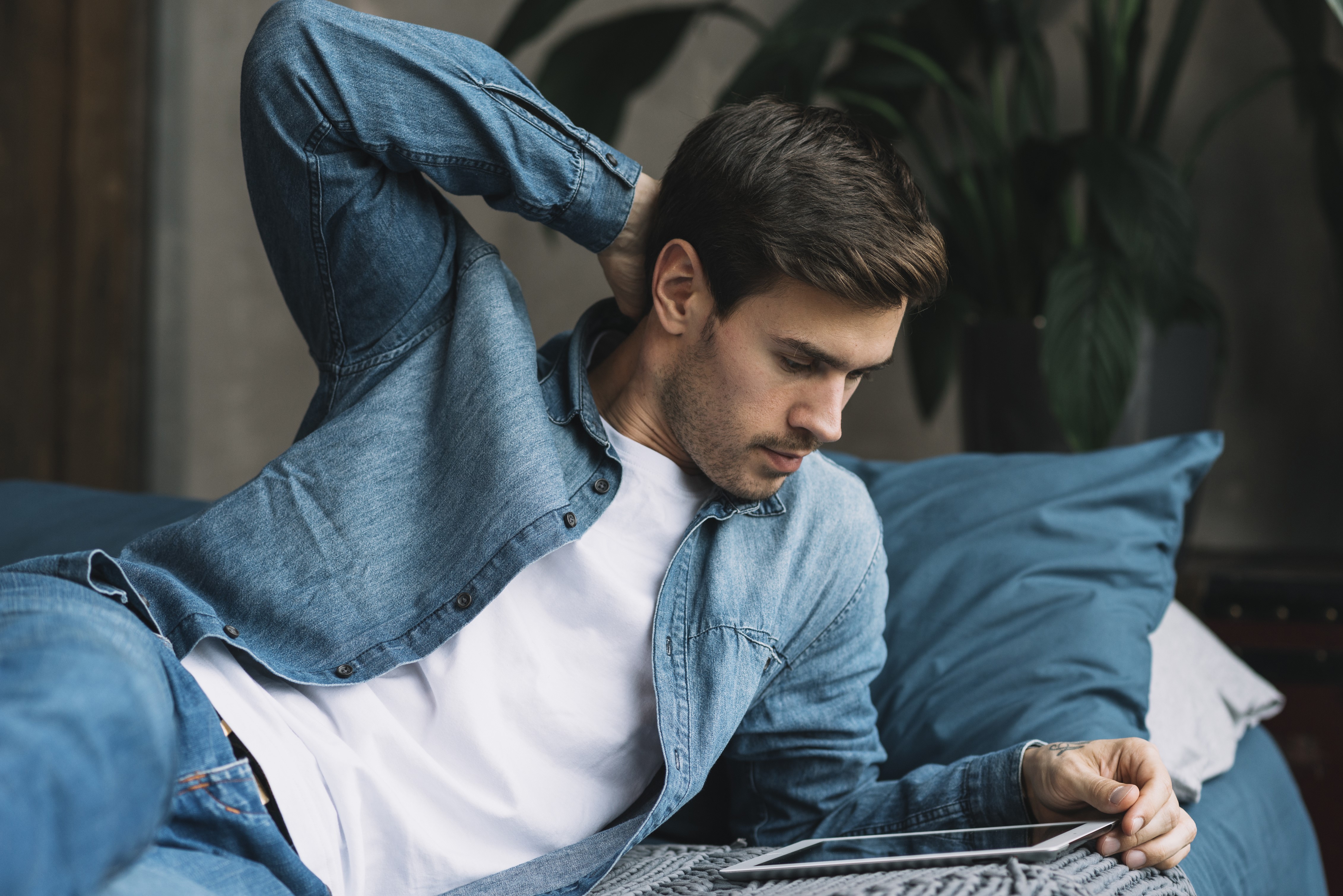 Man in Denim Jacket Using Tablet Computer HD Wallpaper