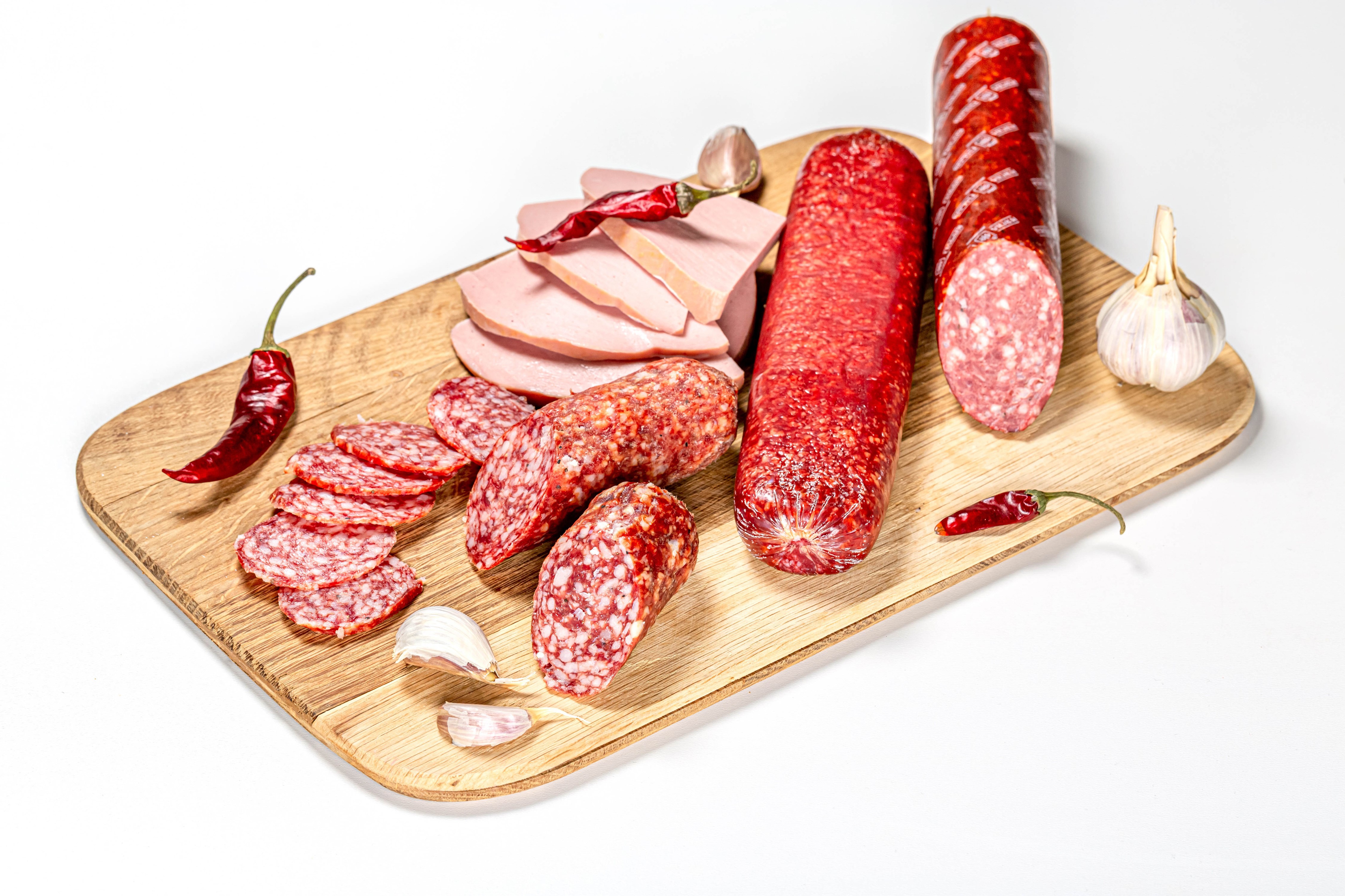 Sausage, Chili Pepper, Garlic, and Sliced Food on Cutting Board HD Wallpaper
