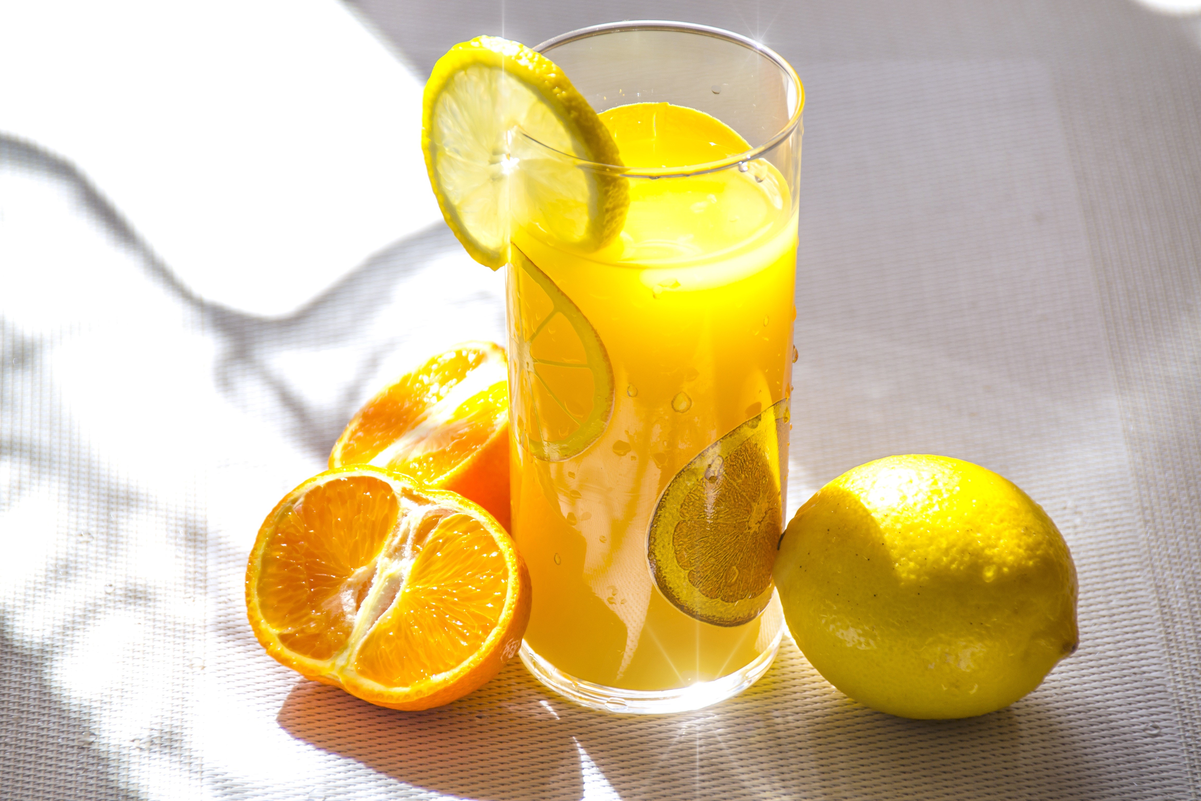 Orange juice with lemon and oranges HD Wallpaper