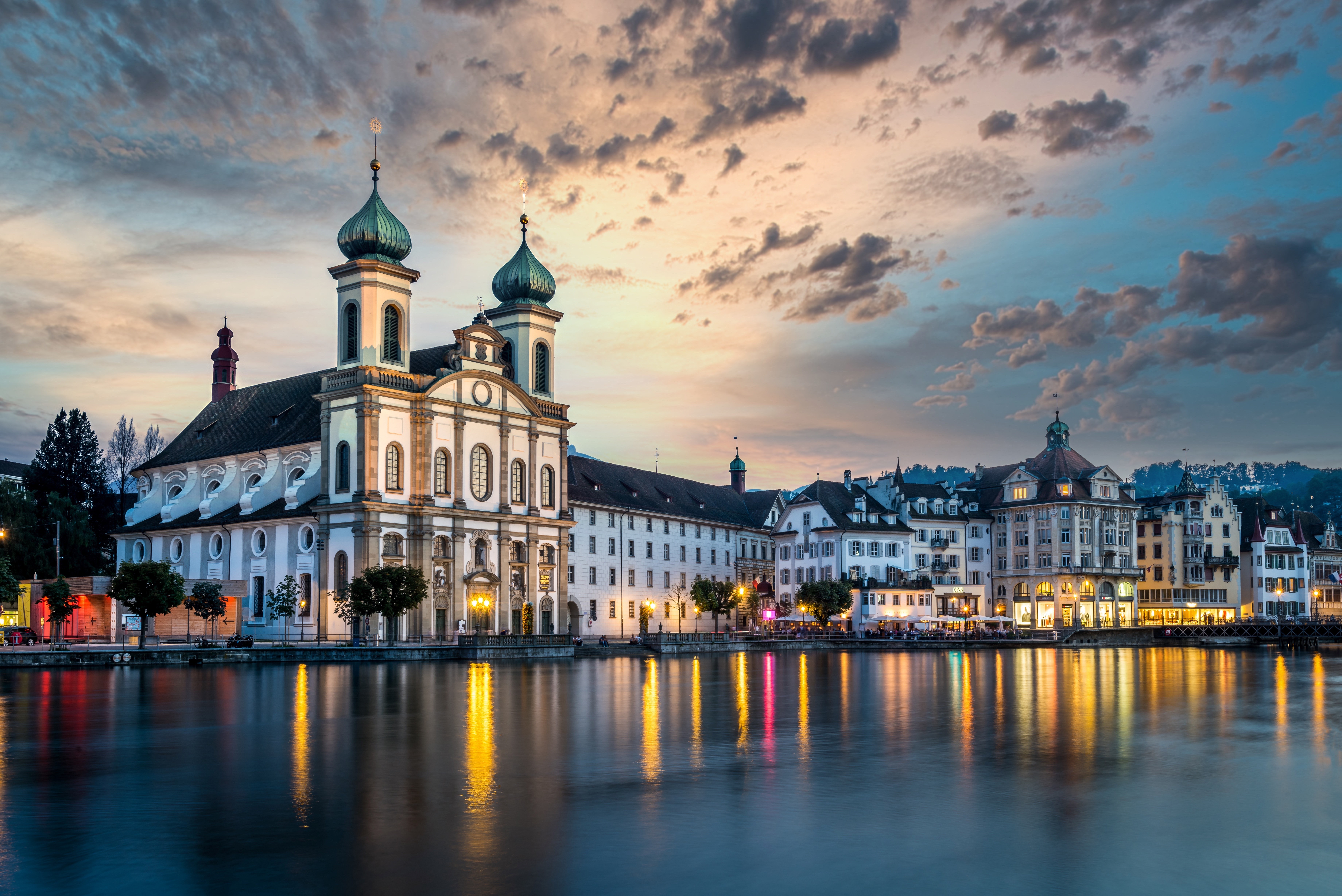 Jesuit Church and Lucerne cityscape on Reuss River at dusk HD Wallpaper